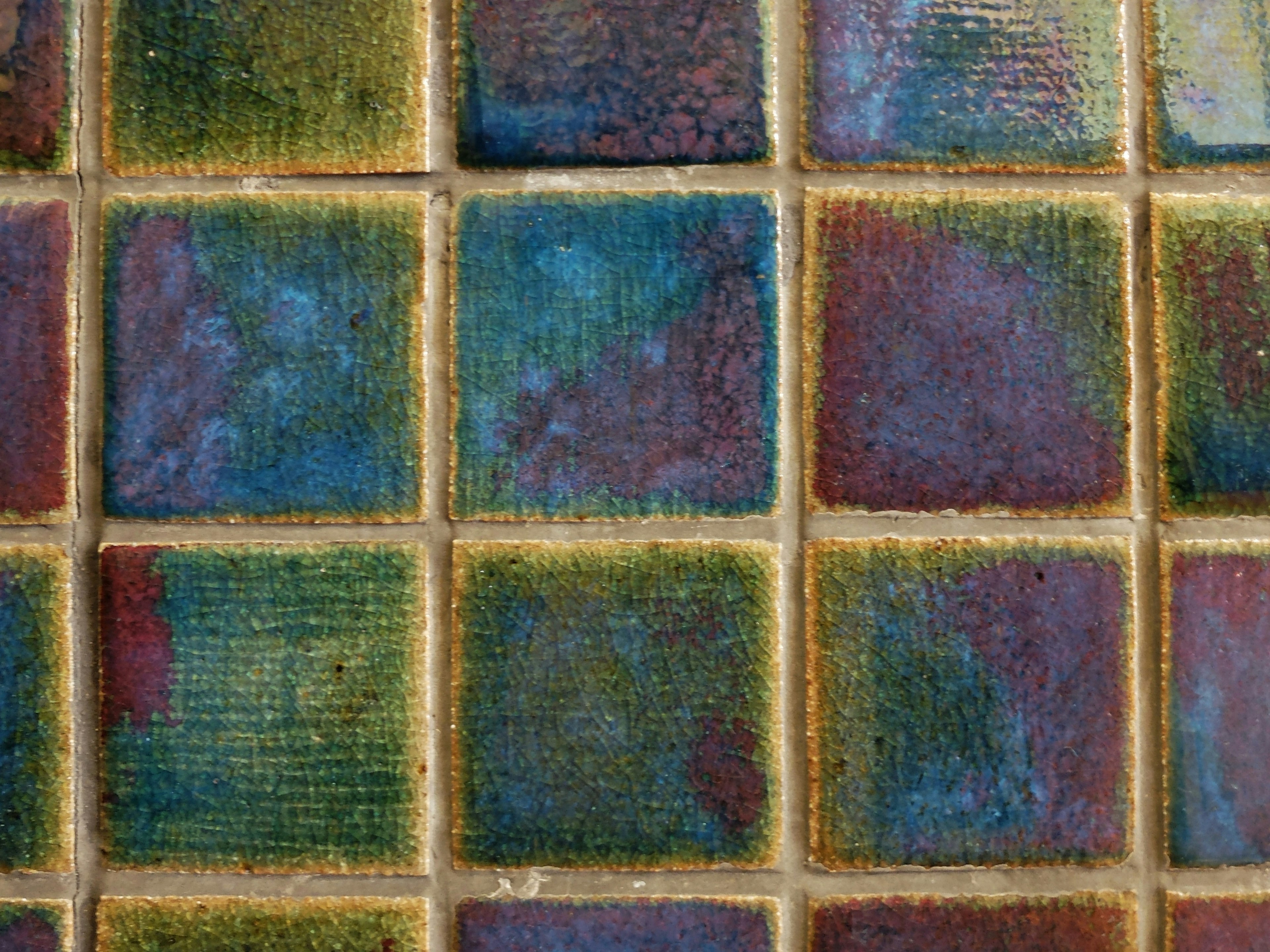 Colorful tile pattern with varying shades of blue and green