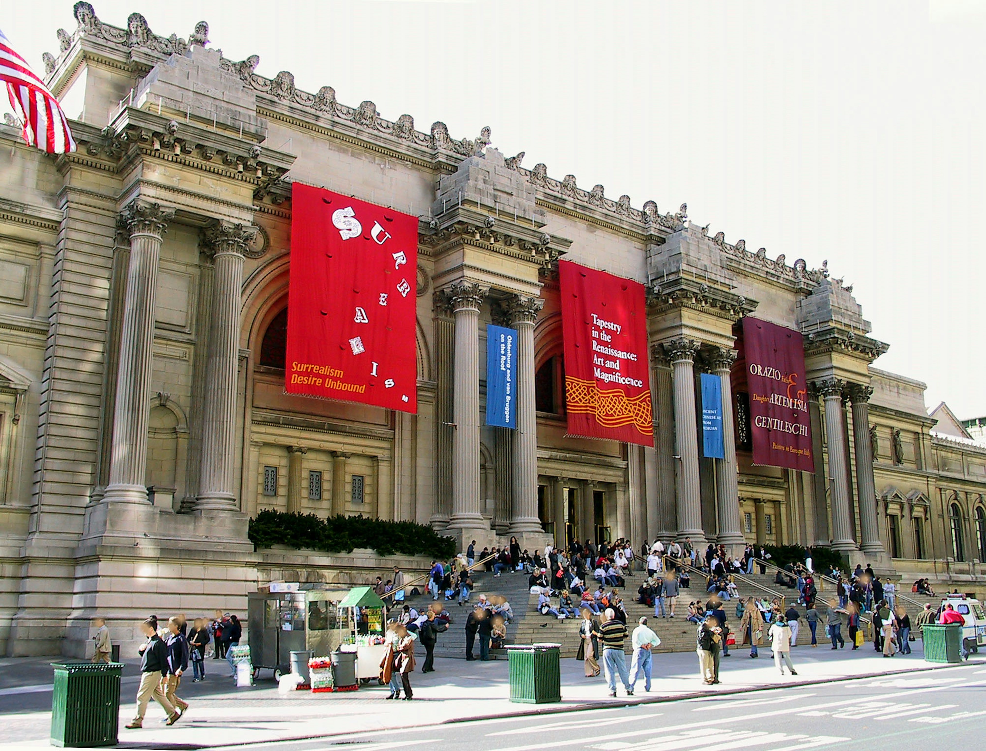 The grand exterior of the Metropolitan Museum of Art with visitors