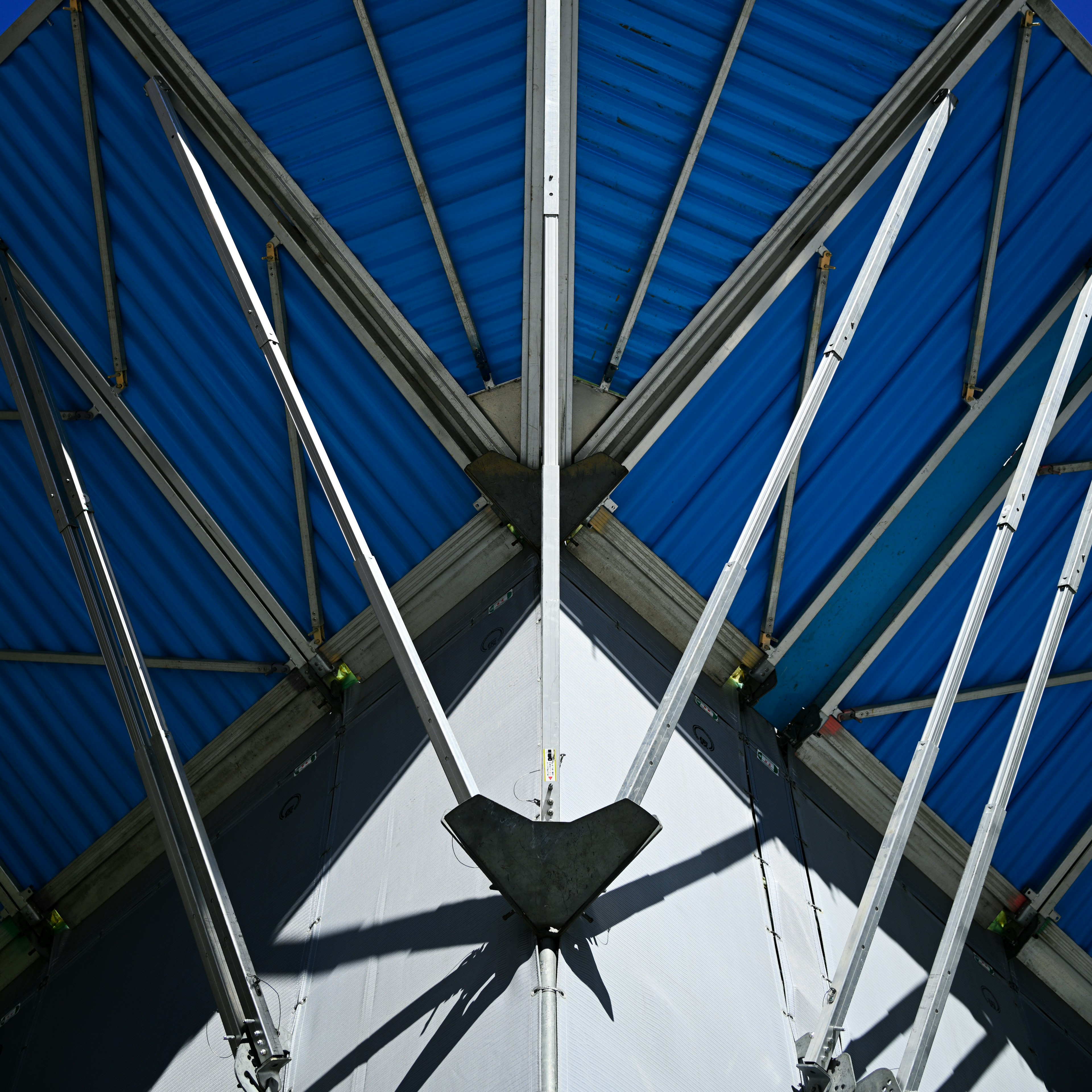 Crossing design of blue roof and metal structure