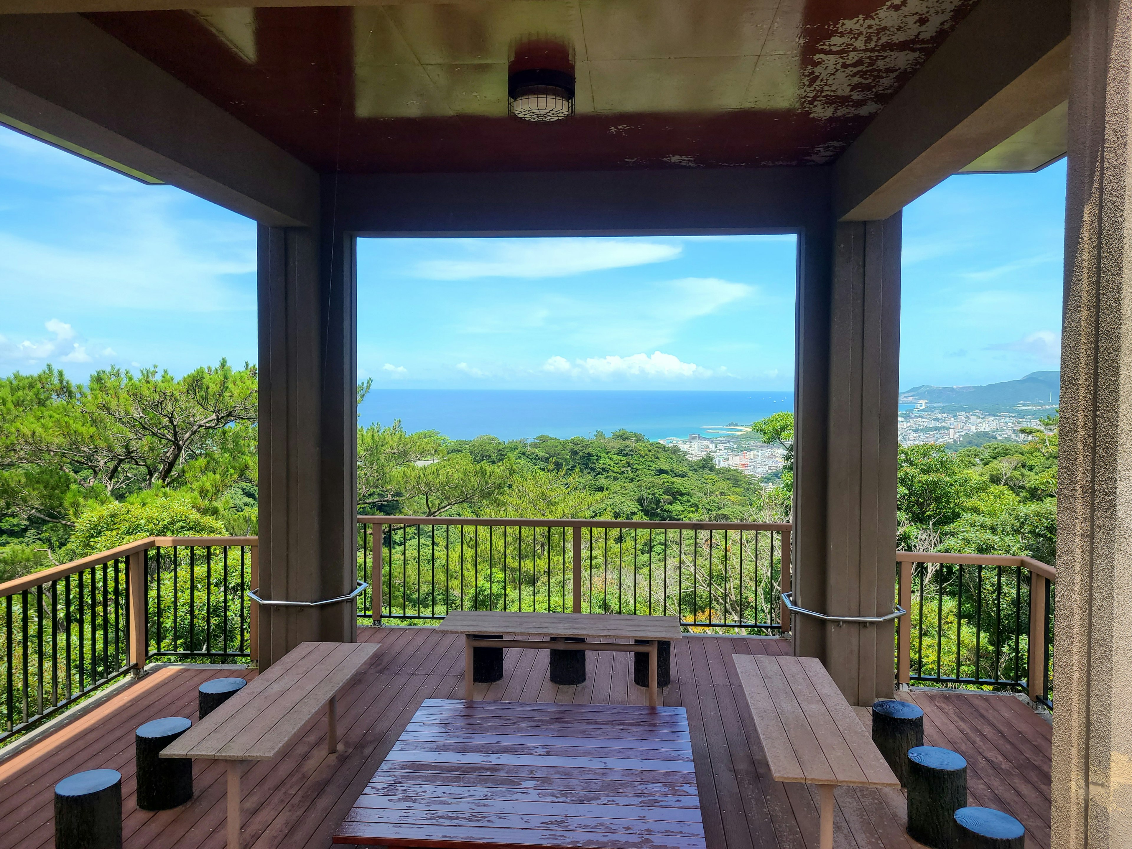 Spacious wooden deck with a view of the ocean