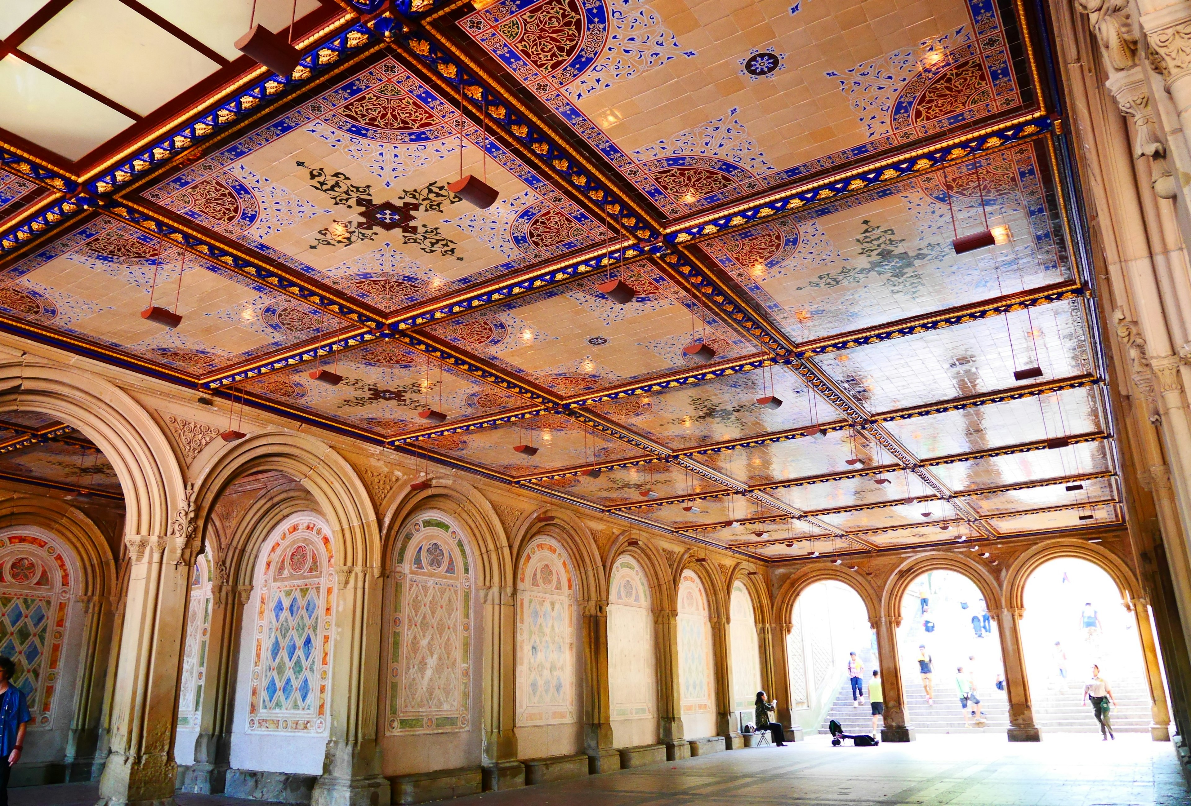 Beautifully decorated arched corridor with colorful ceiling