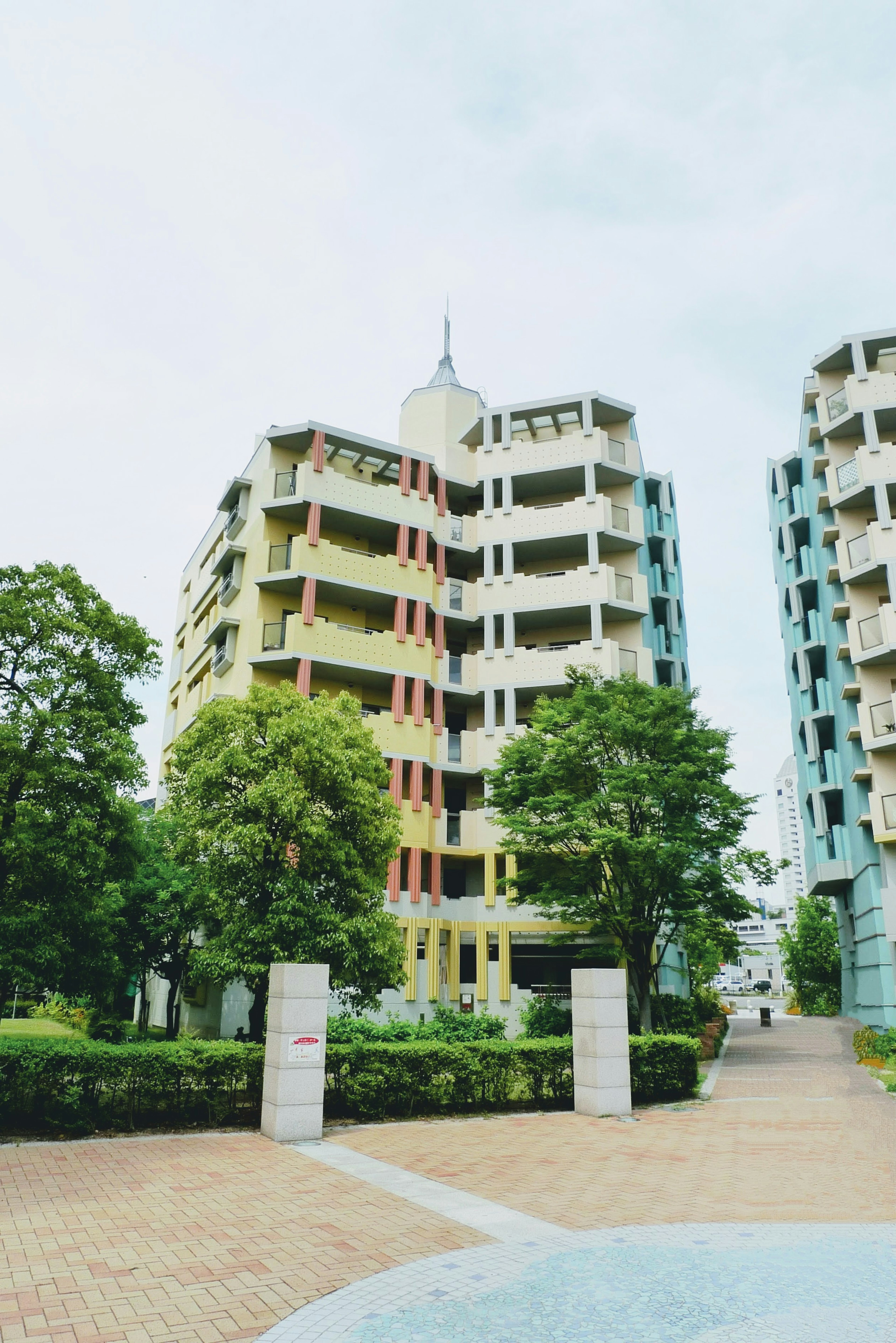 Colorful buildings with green trees in a modern residential area