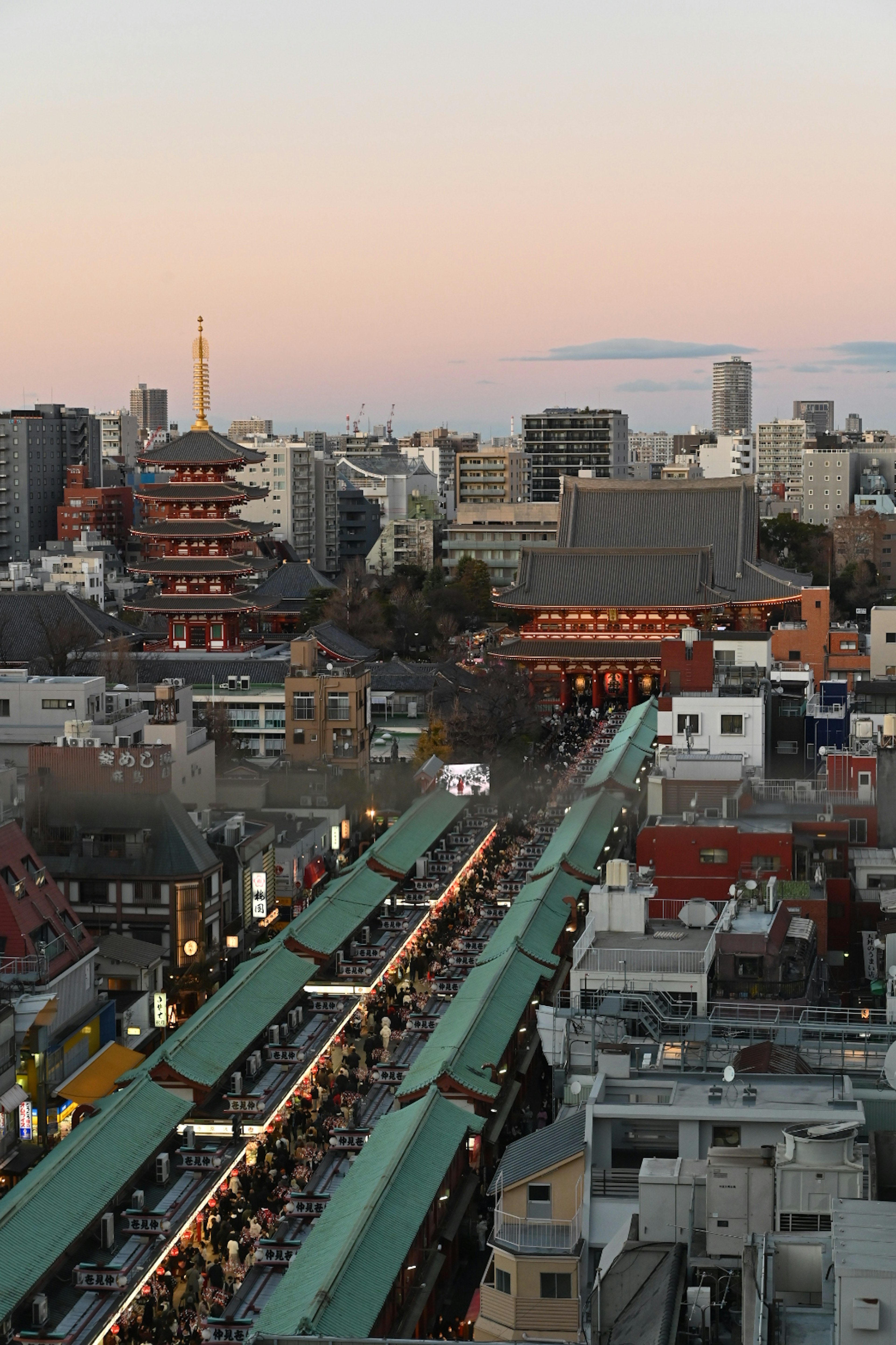 Cityscape of Tokyo featuring Asakusa Temple and Tokyo Tower at sunset