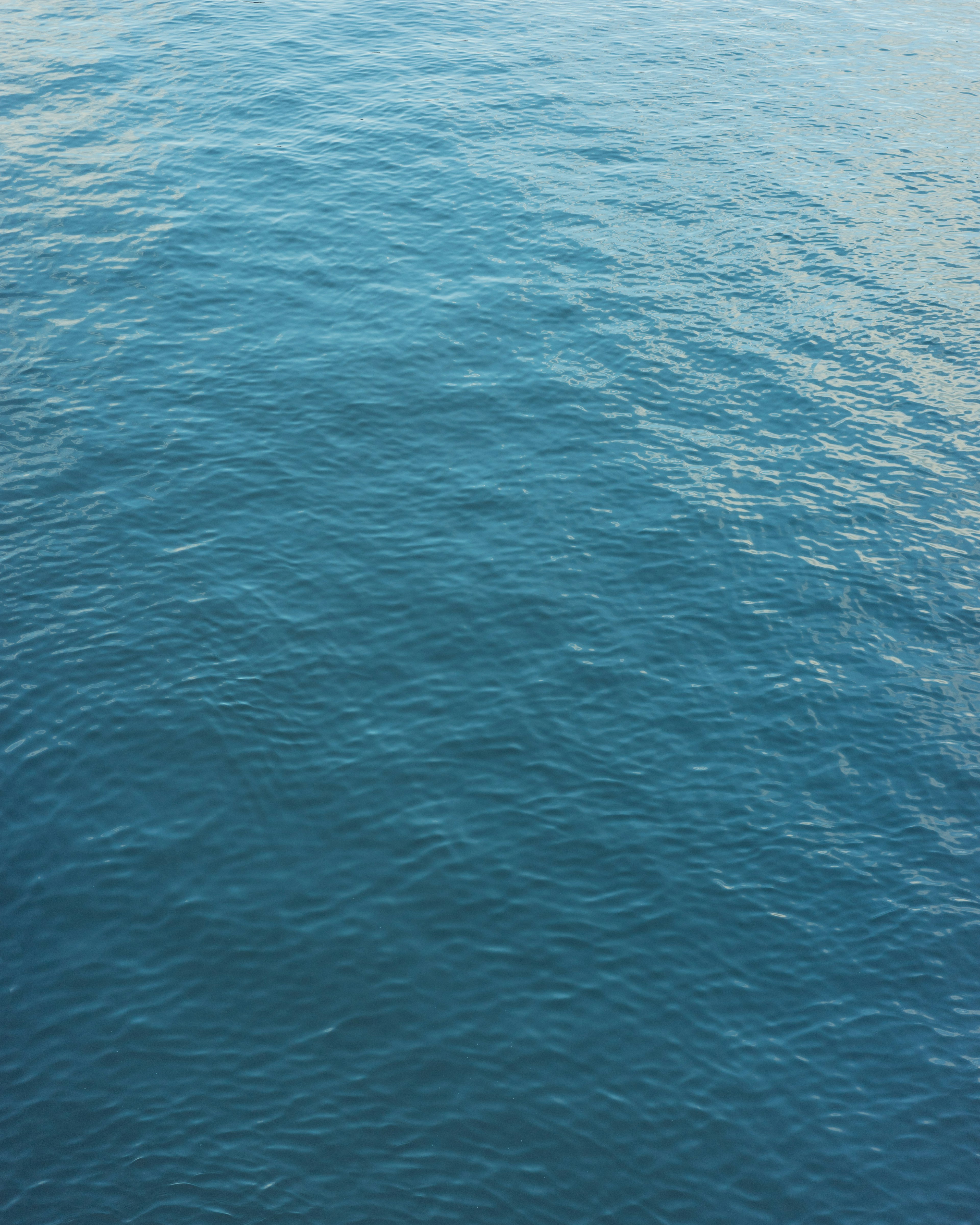 Calm surface of blue ocean water