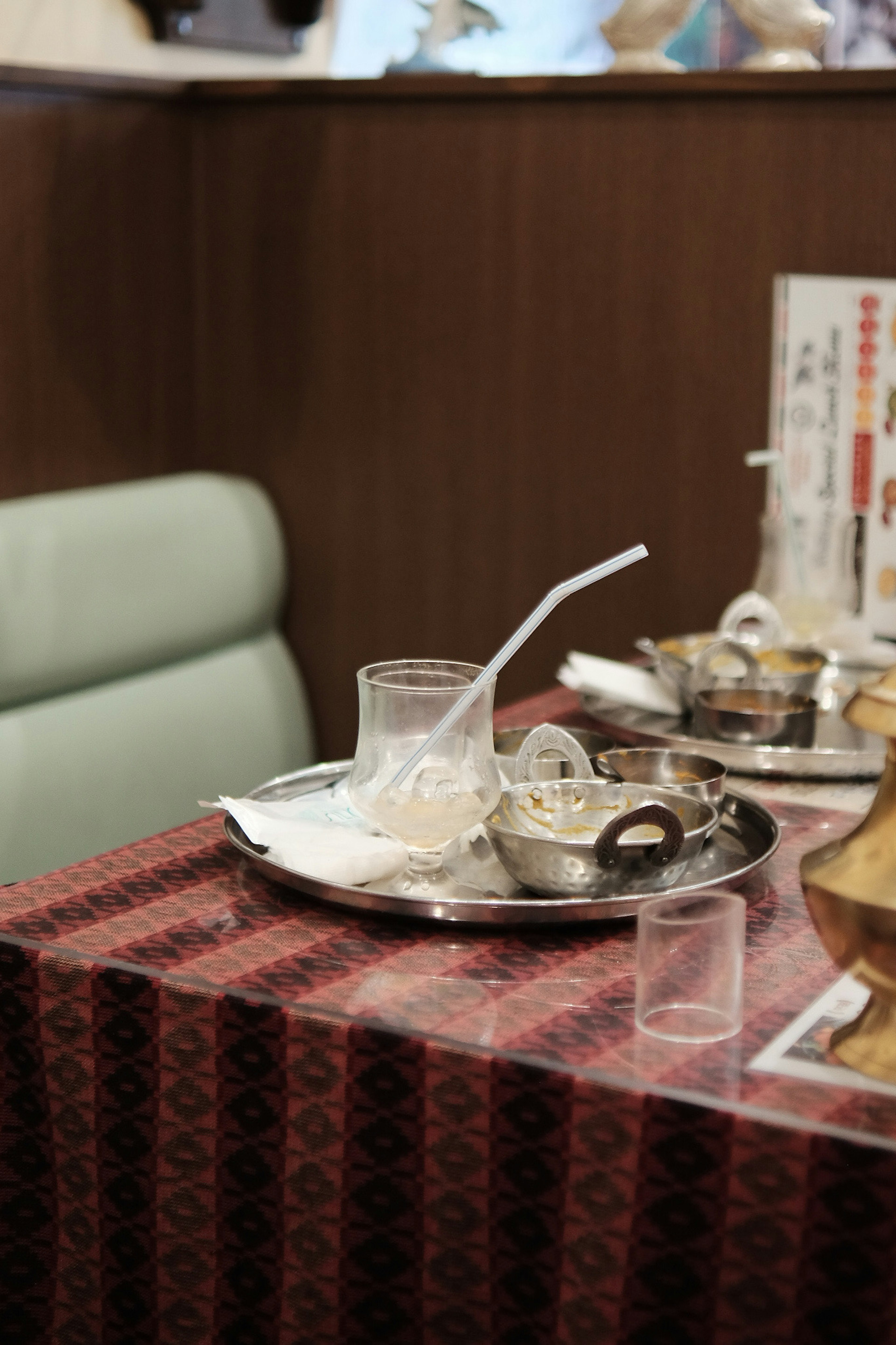 Table setting with various dishes and drinks on a tray