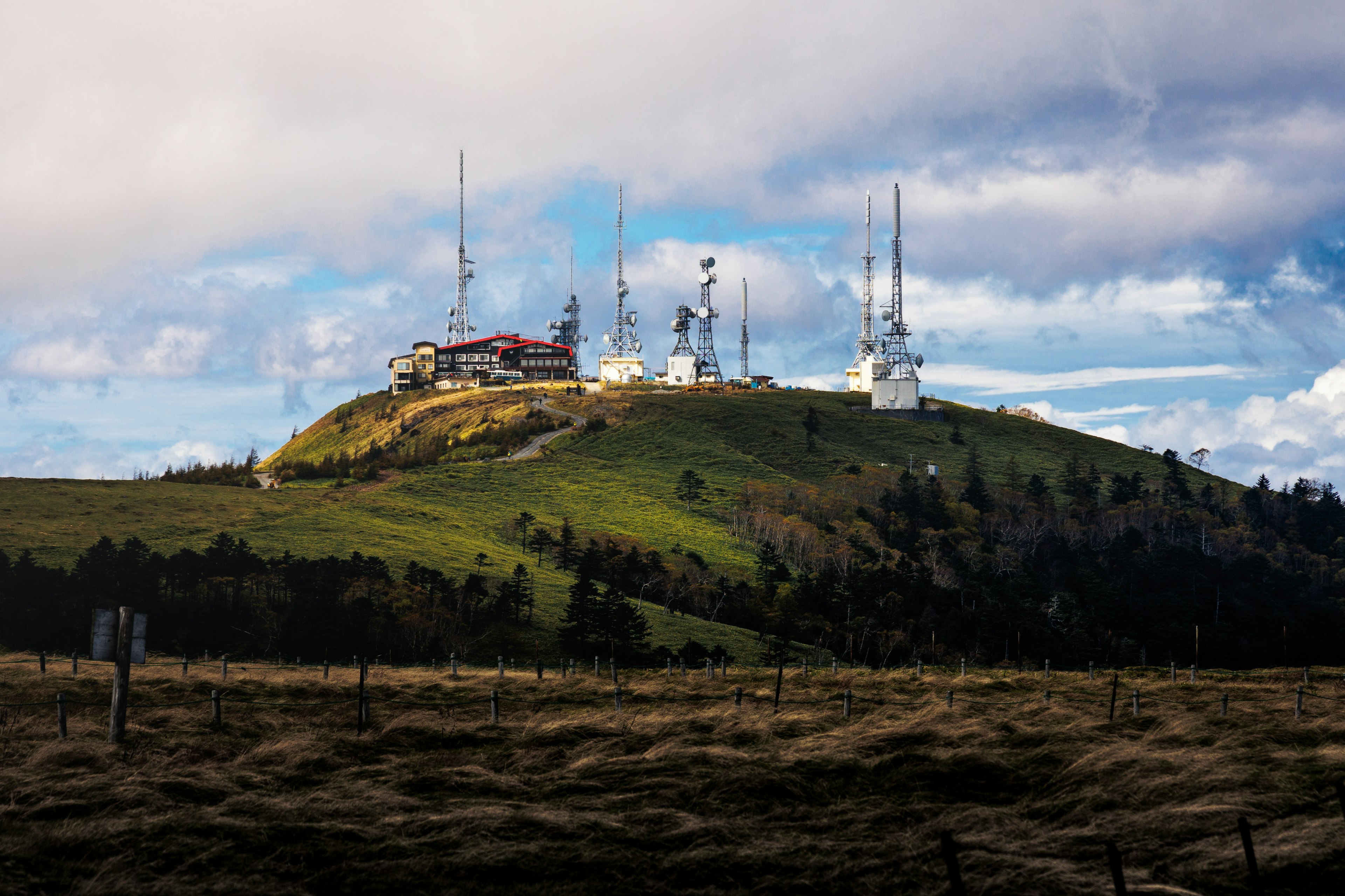 Multiple antennas and communication facilities on a hill