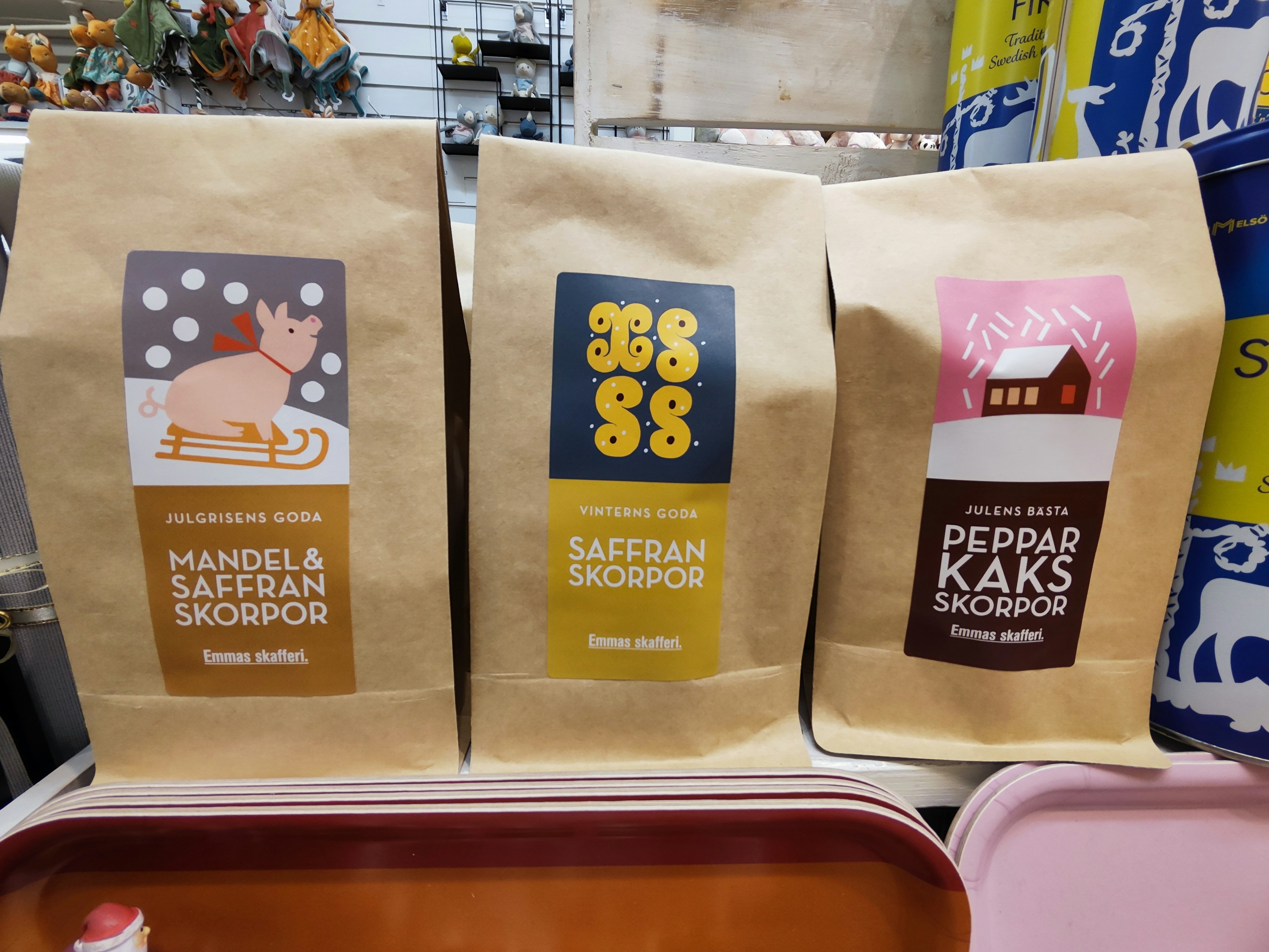 Three different snack packages displayed with unique designs and colors featuring specific snack names