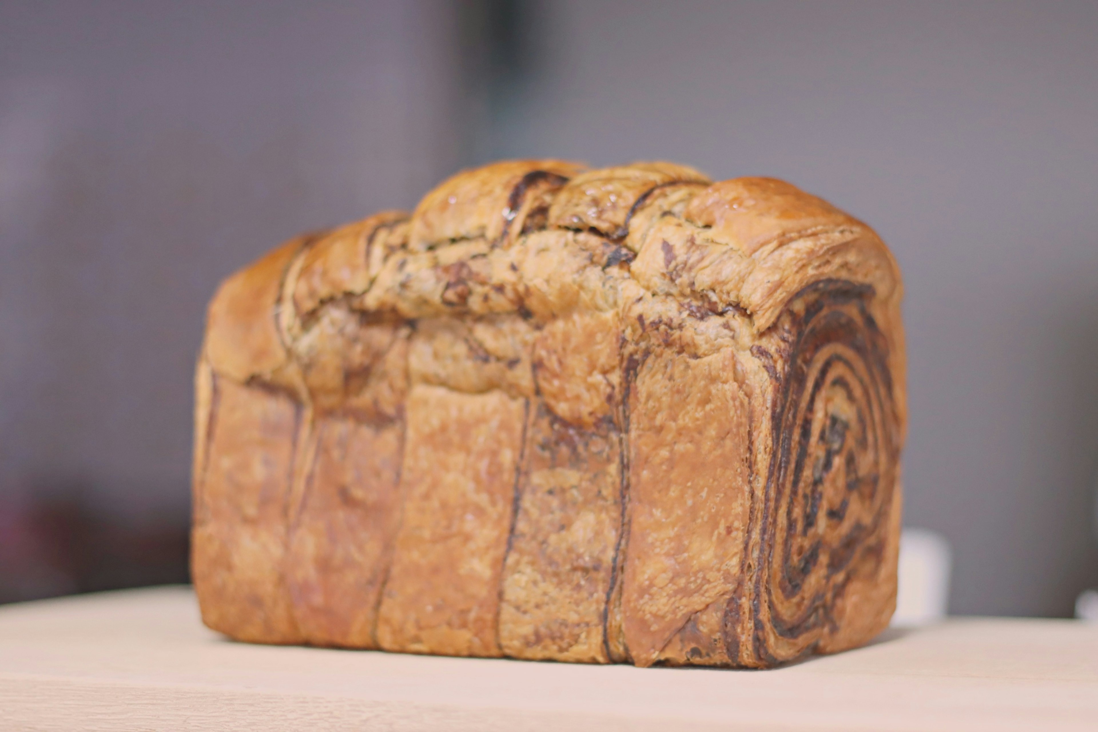 Loaf of marble swirl bread with a golden crust