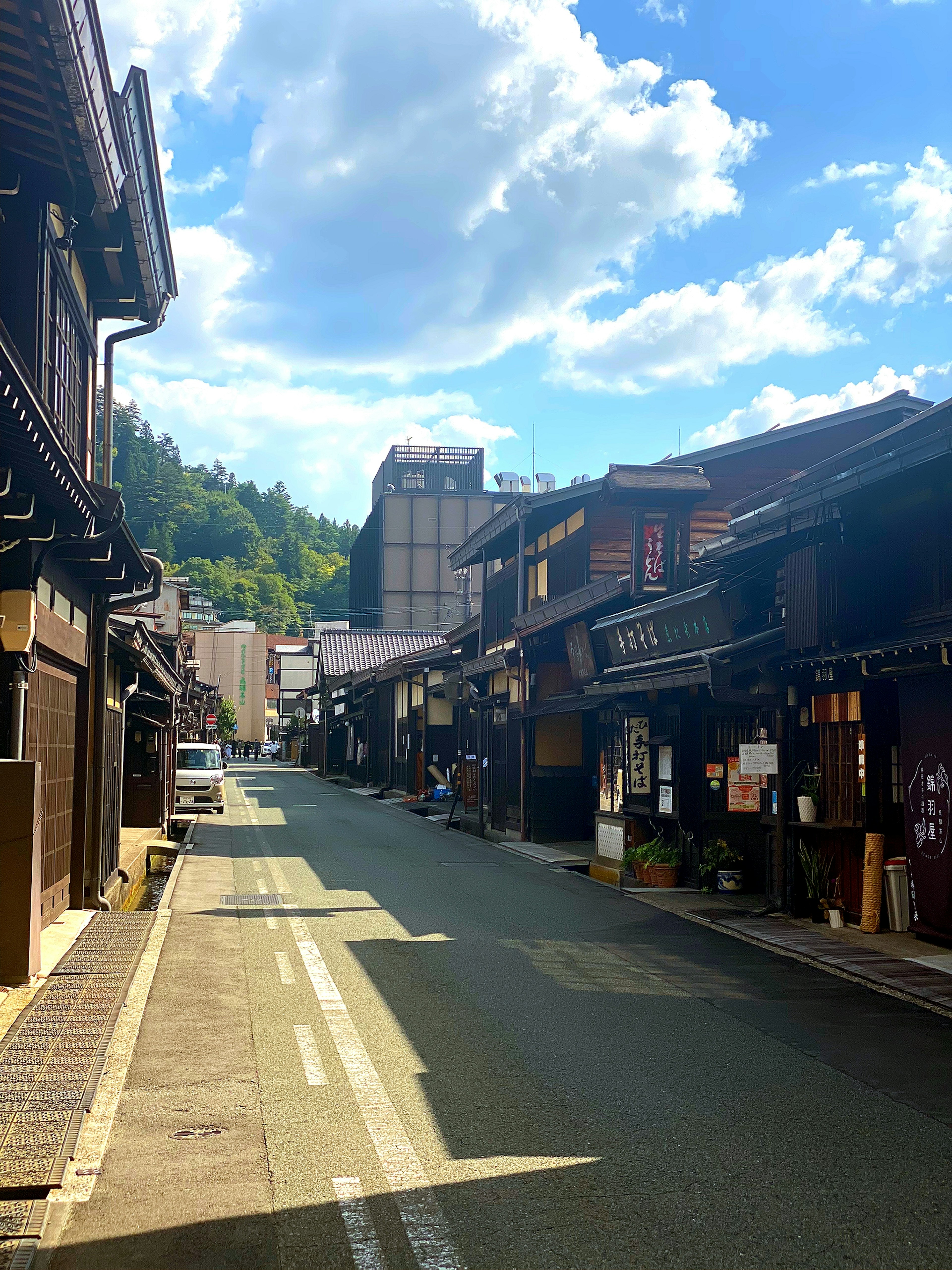 Quiet street featuring traditional Japanese architecture