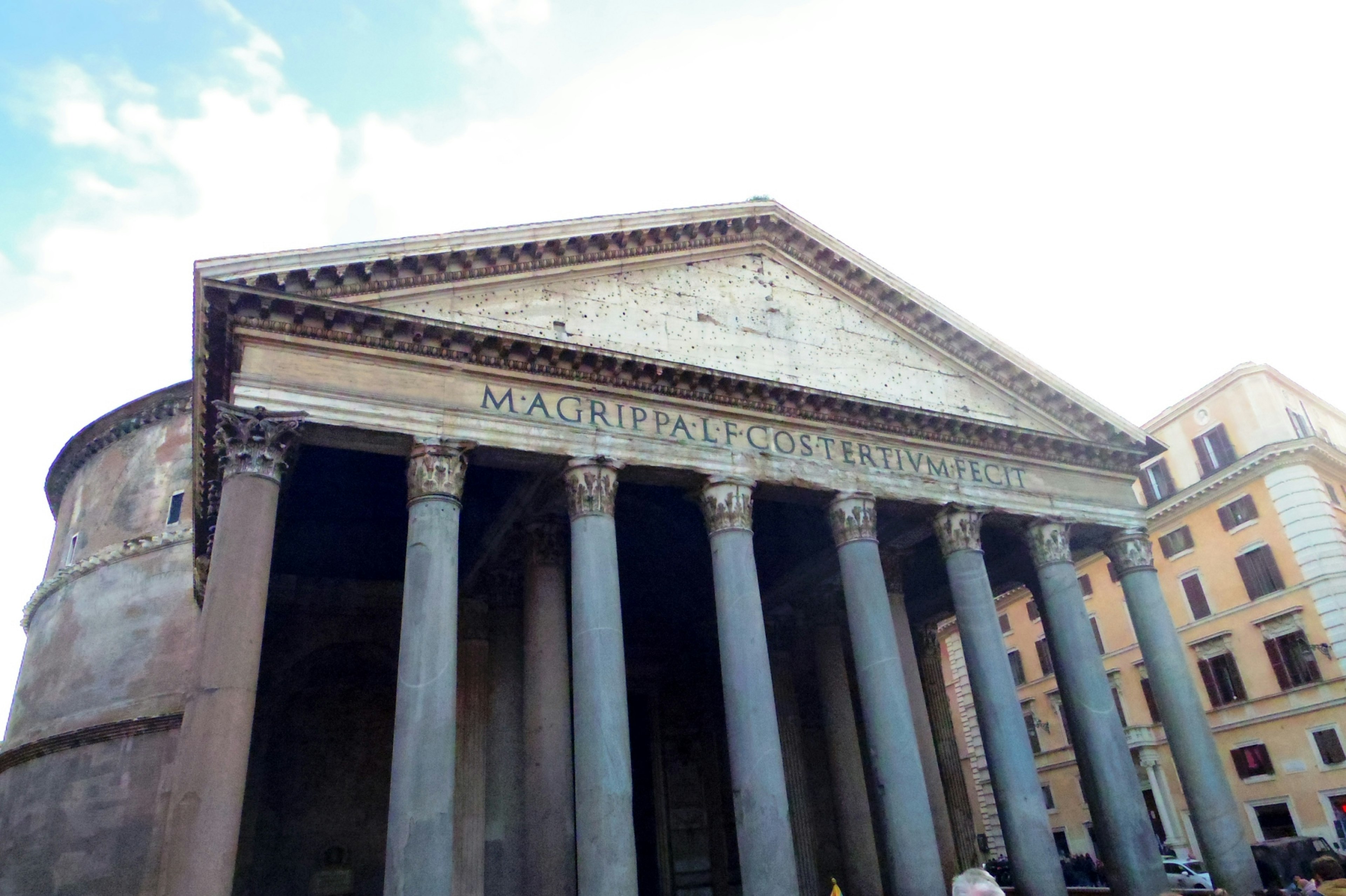 The majestic exterior of the Pantheon in Rome with ancient columns