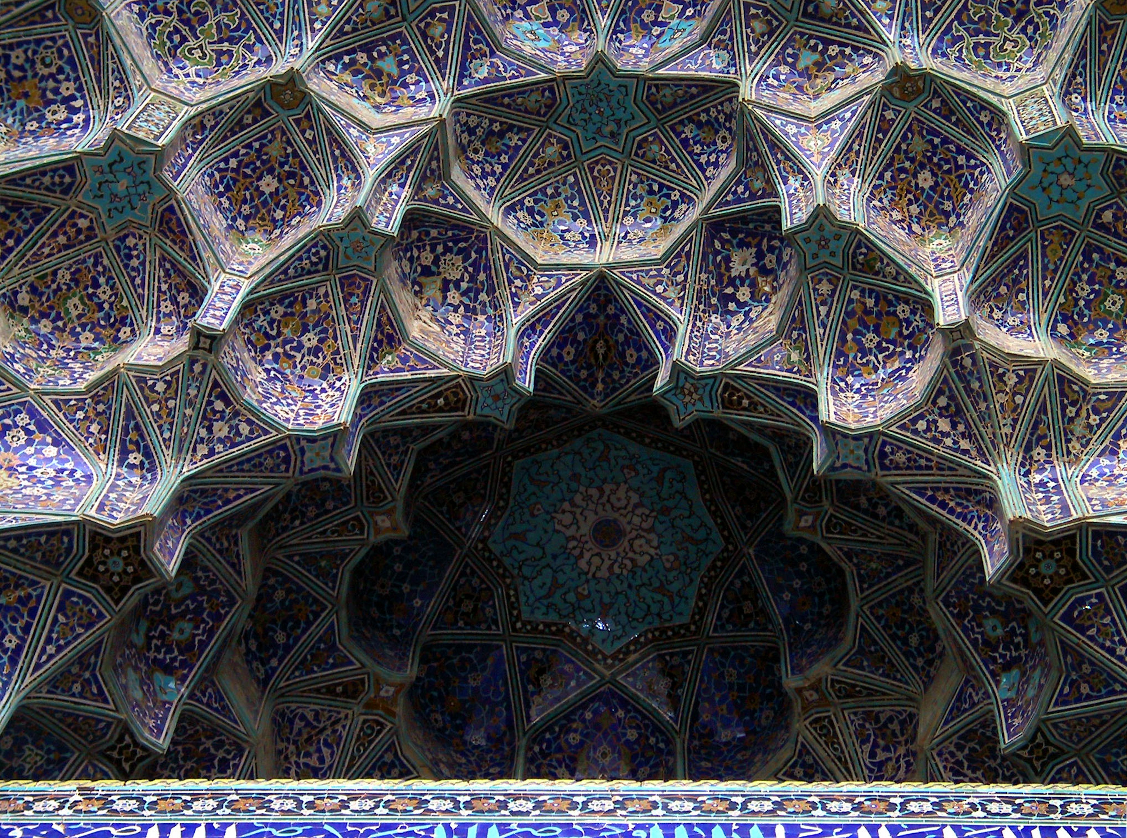 Intricate ceiling design of Islamic architecture with vibrant tile patterns