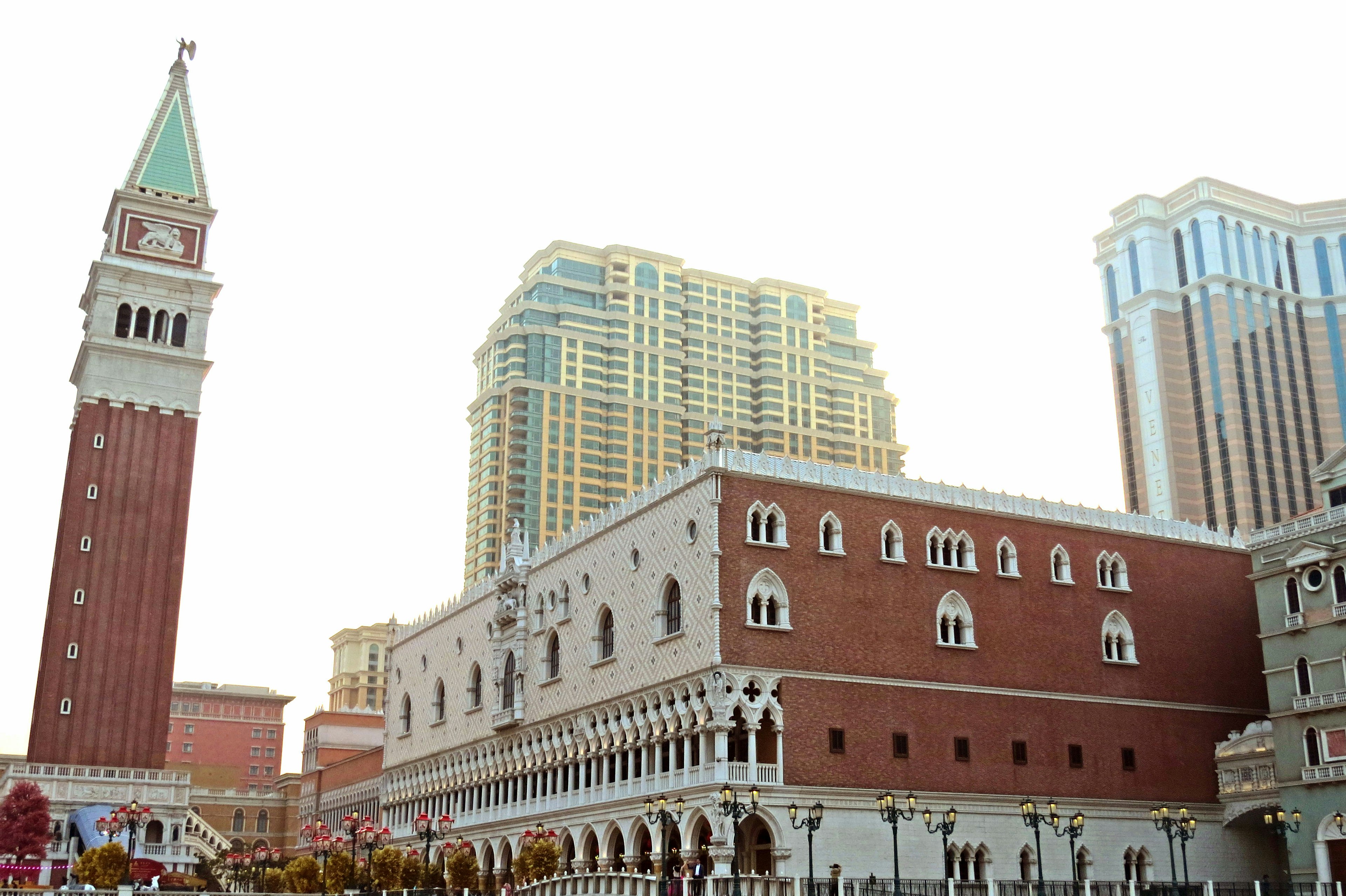 Exterior view of the Venetian Hotel featuring a clock tower