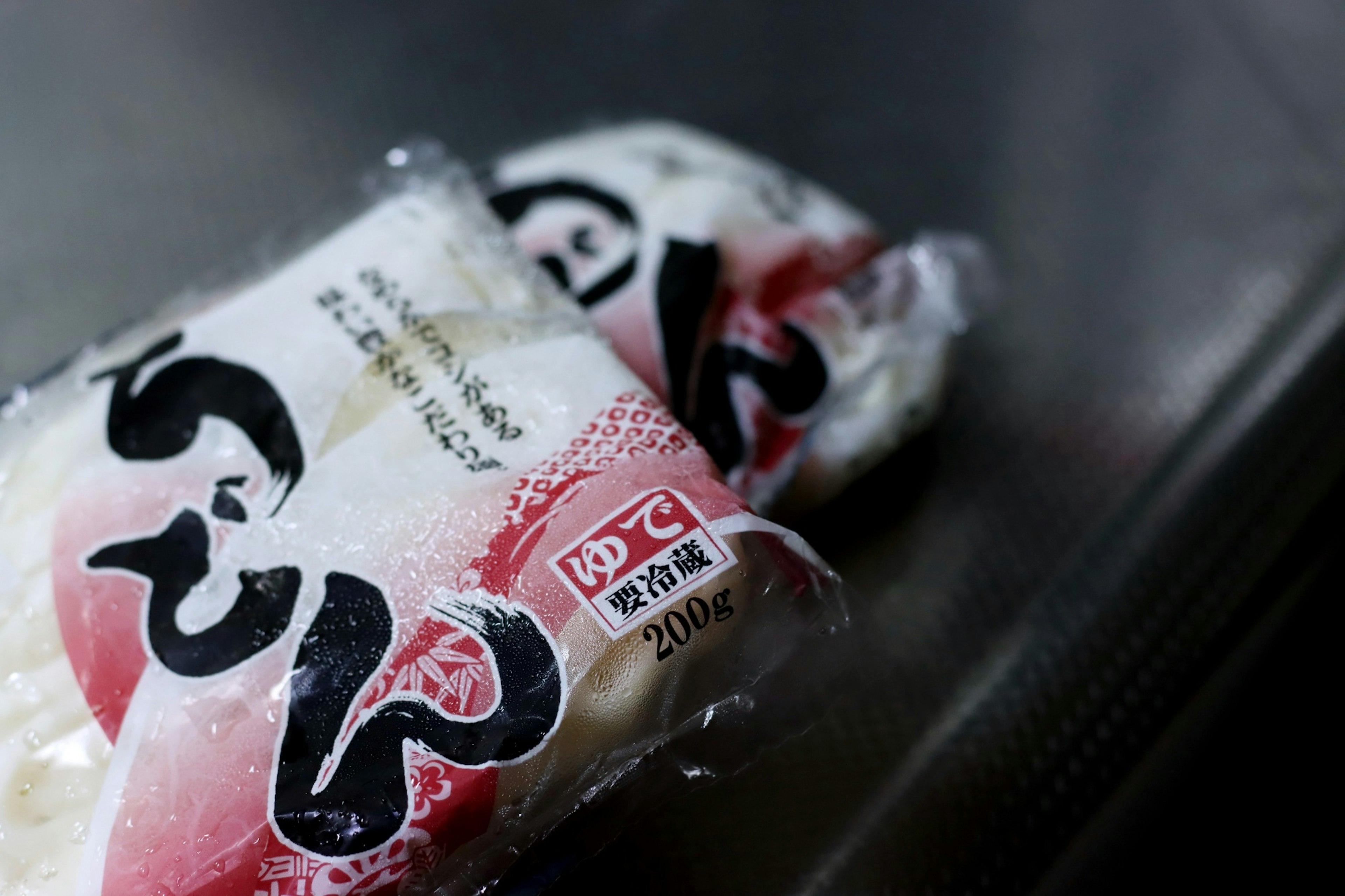 Packaged Japanese rice cake displayed on a surface