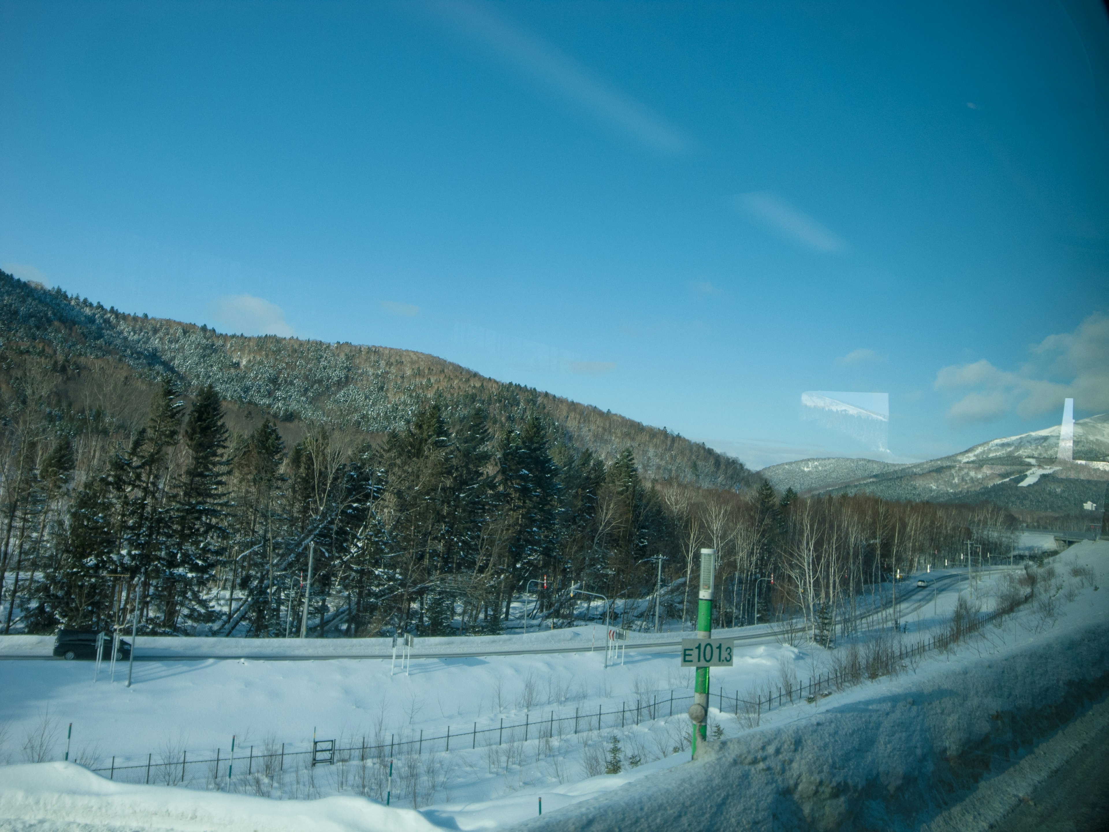 Snow-covered mountains and blue sky landscape