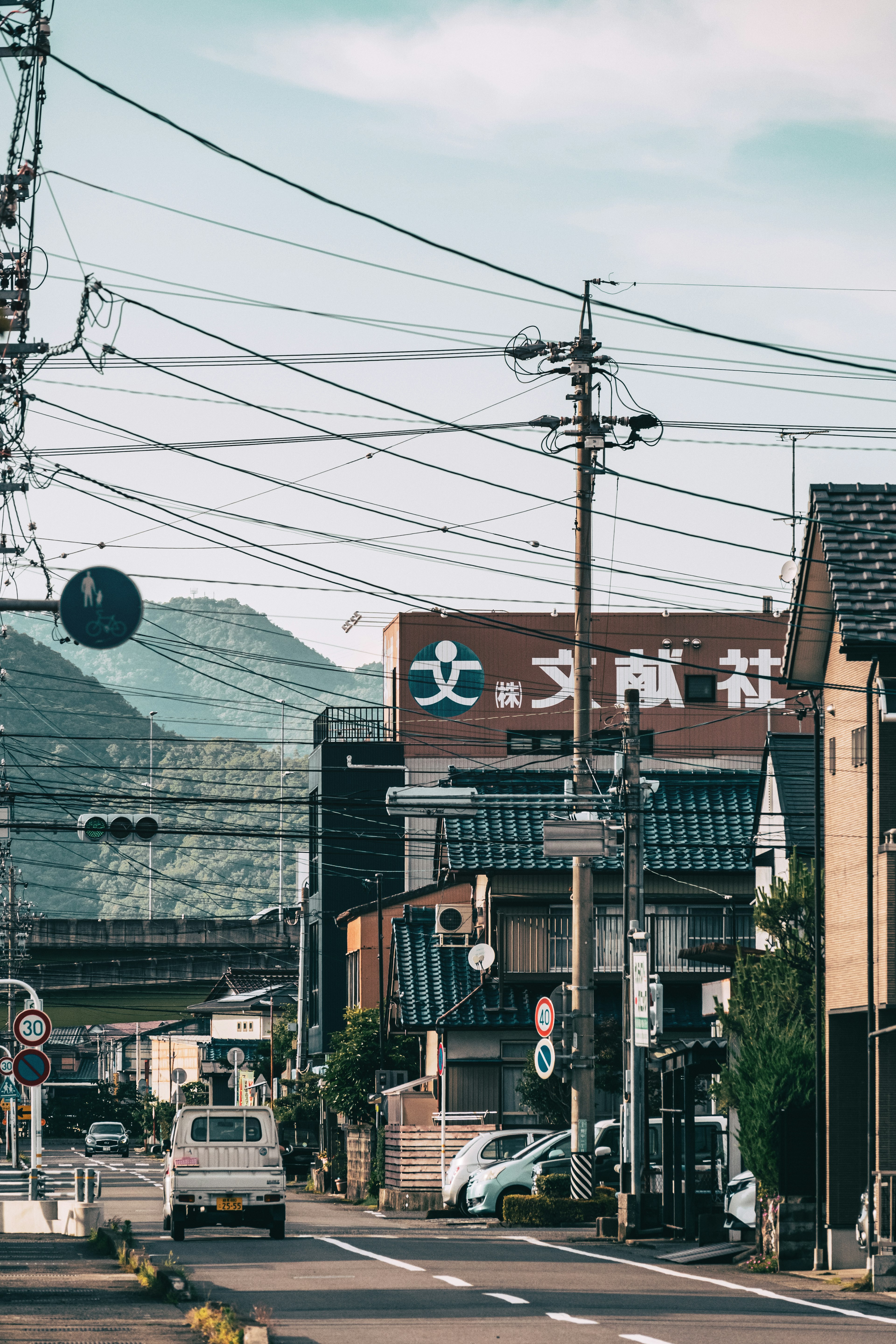 Street view featuring buildings and power lines