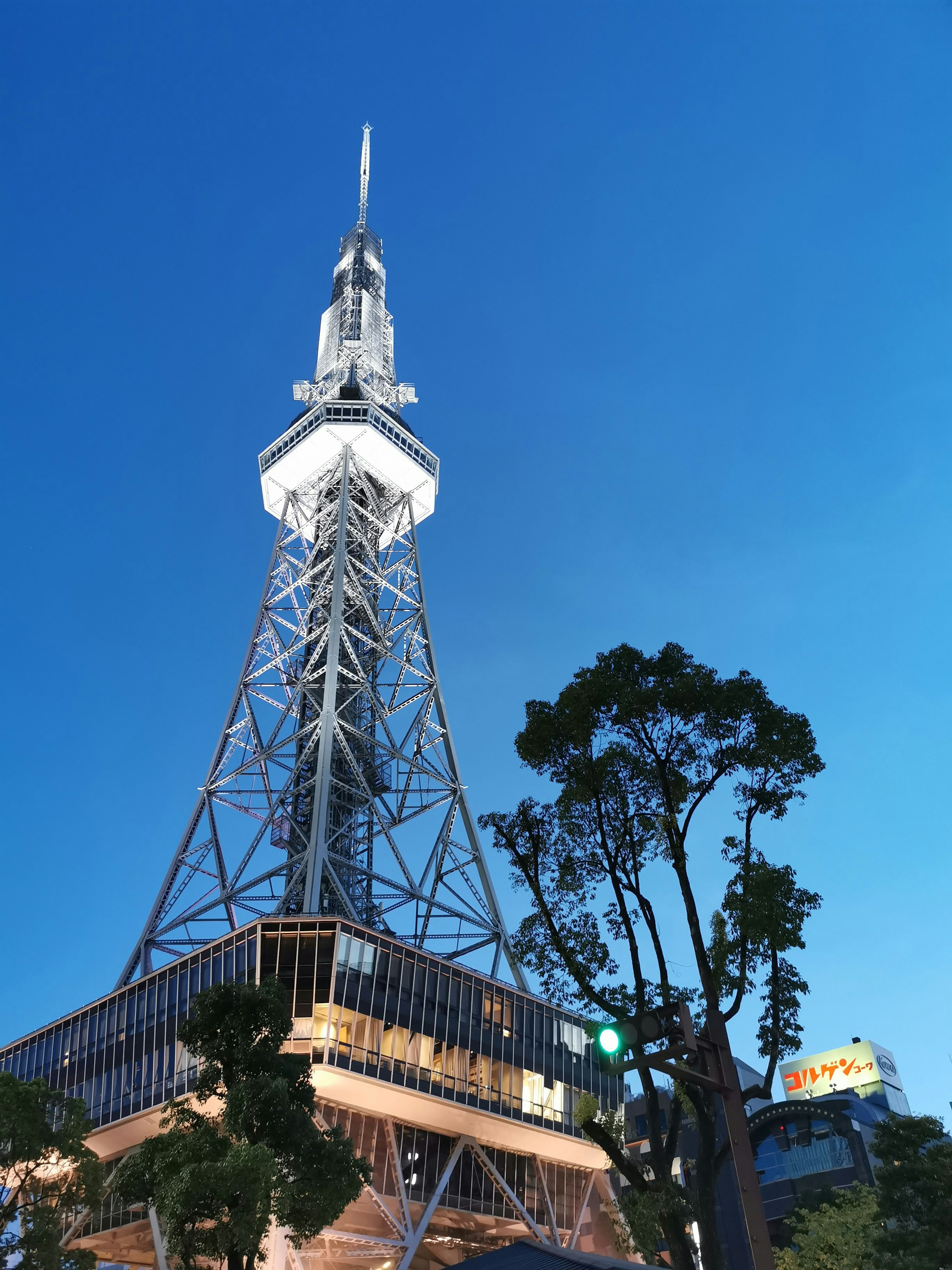 Nagoya TV Tower at night with a blue sky