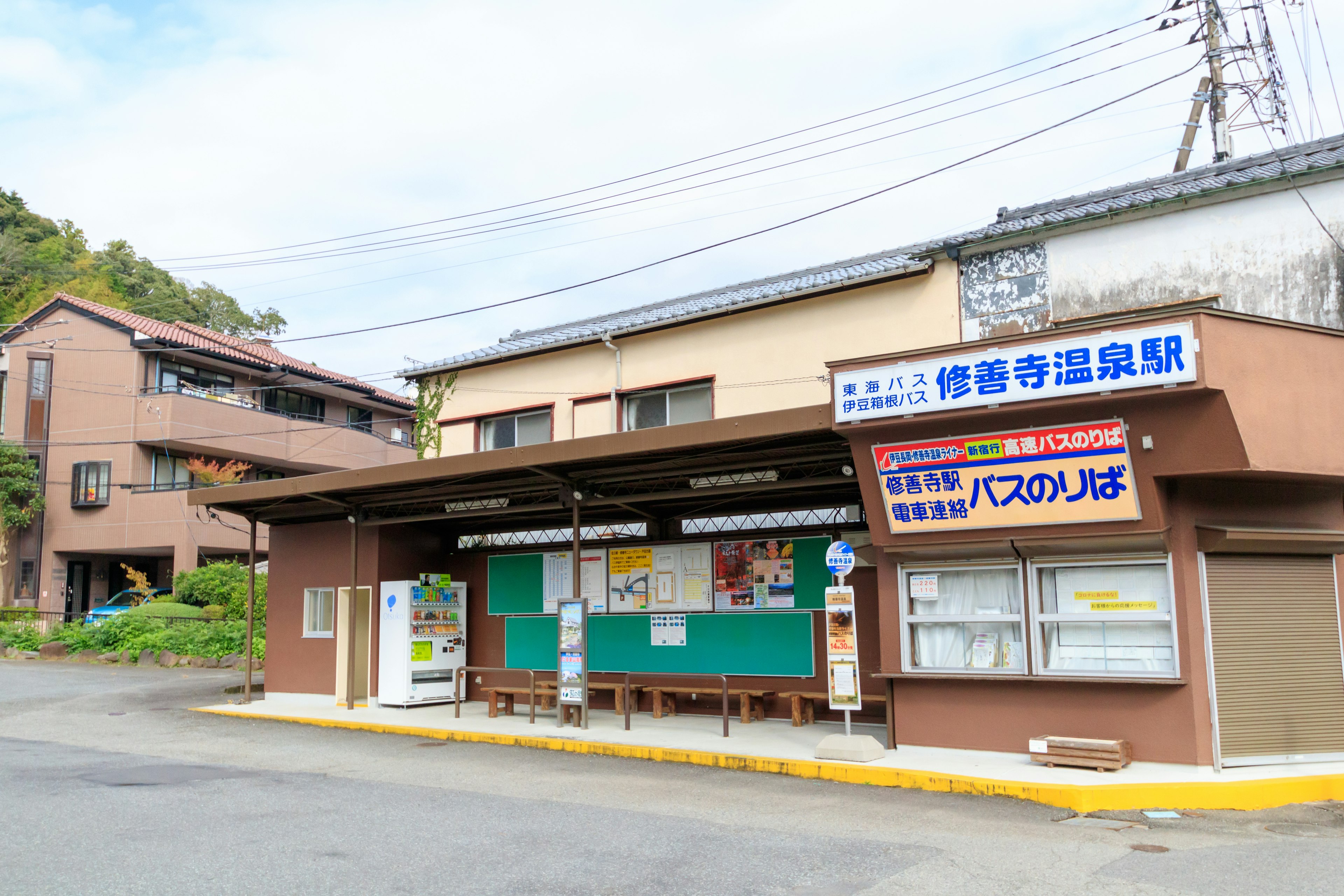 View of a bus stop and train station exterior