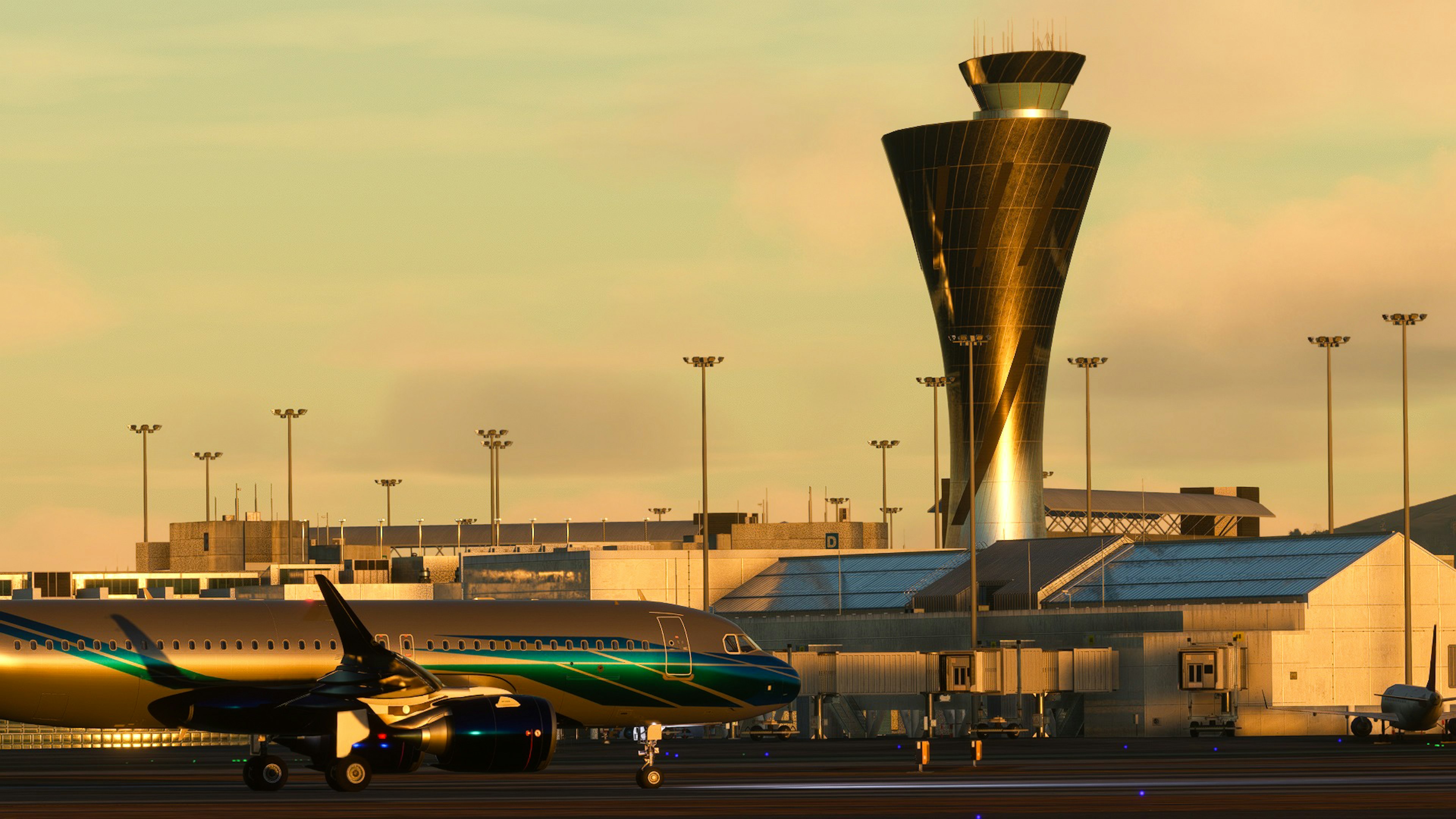 Aereo parcheggiato sulla pista con edifici terminal e torre di controllo al tramonto