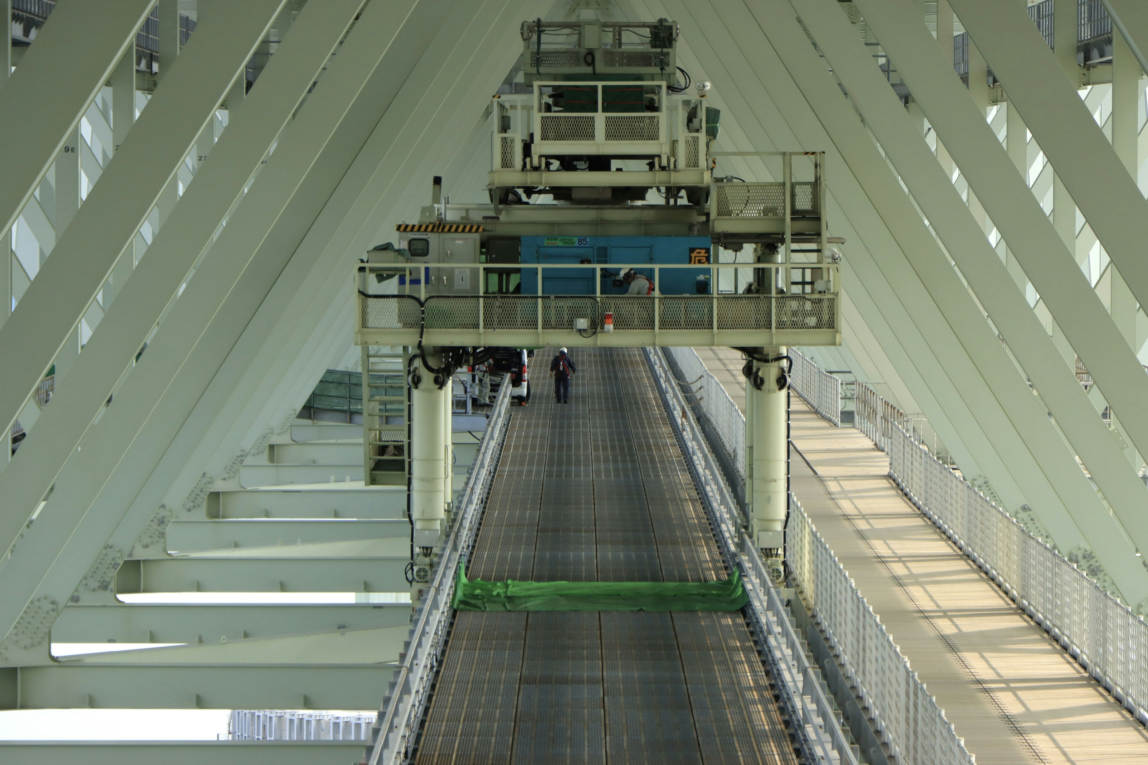 Industrial space showcasing a conveyor belt and machinery