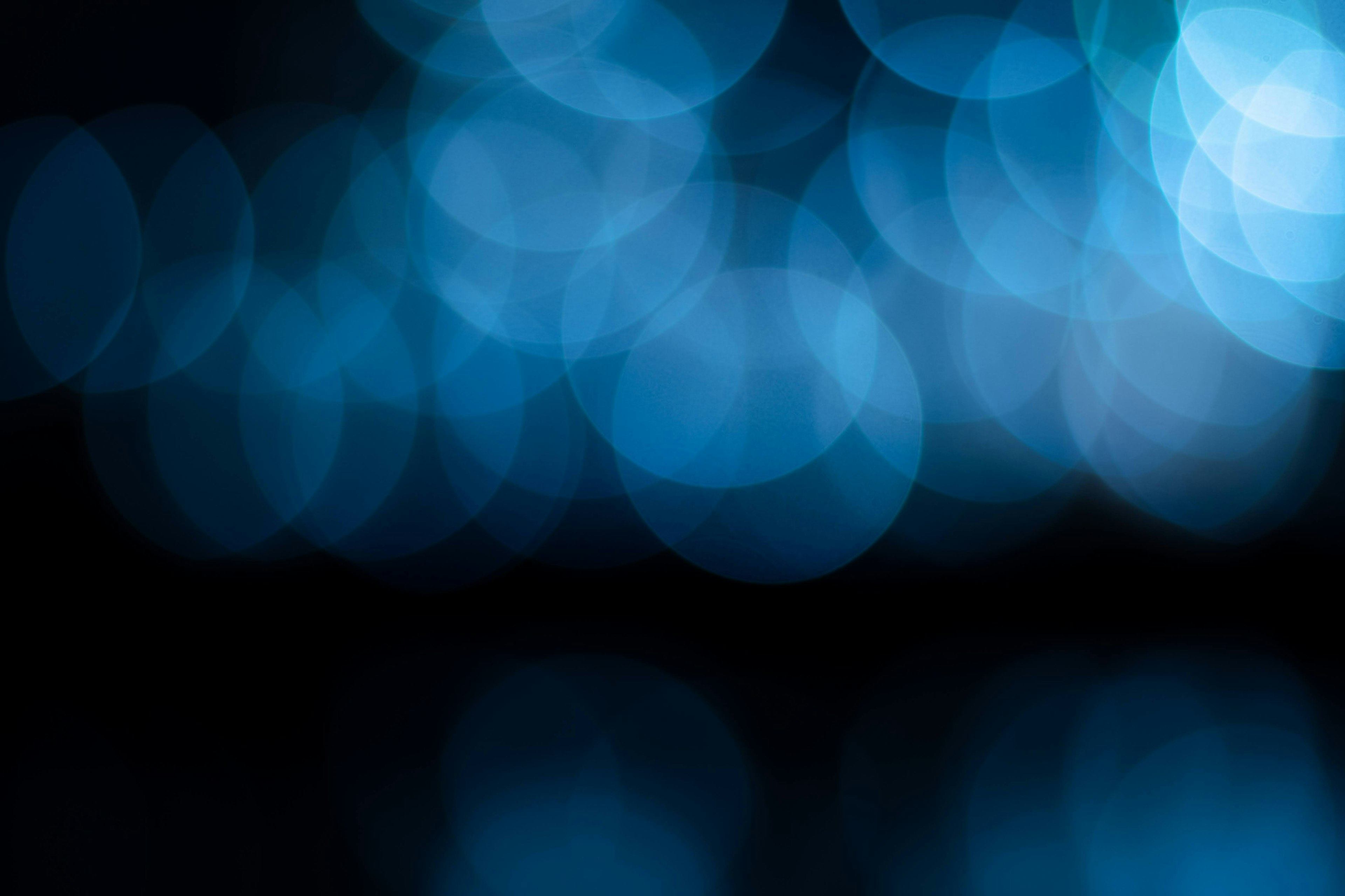 Abstract background with blue bokeh effect