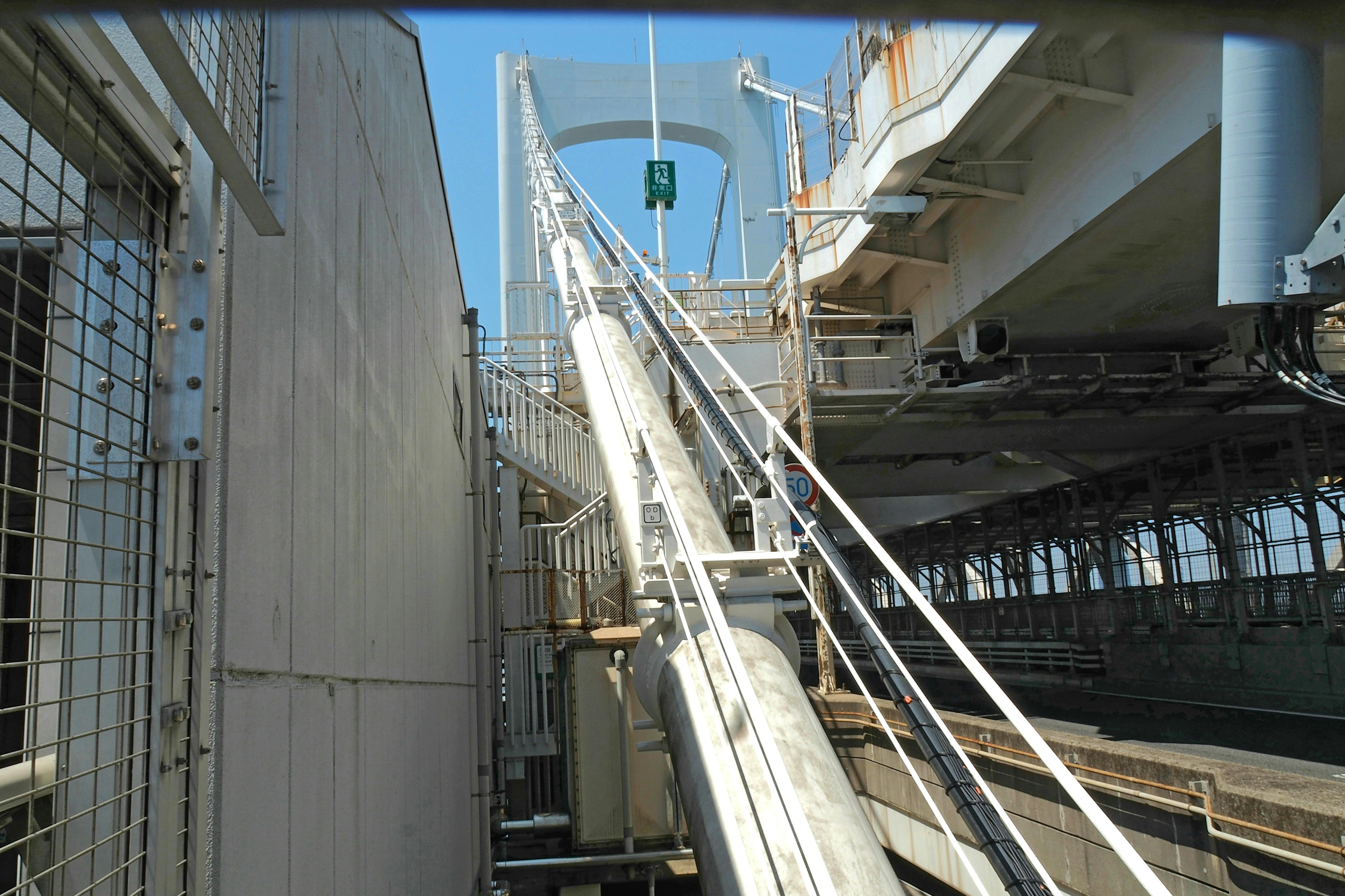 Interior view of a structure with a ship's side and stairs