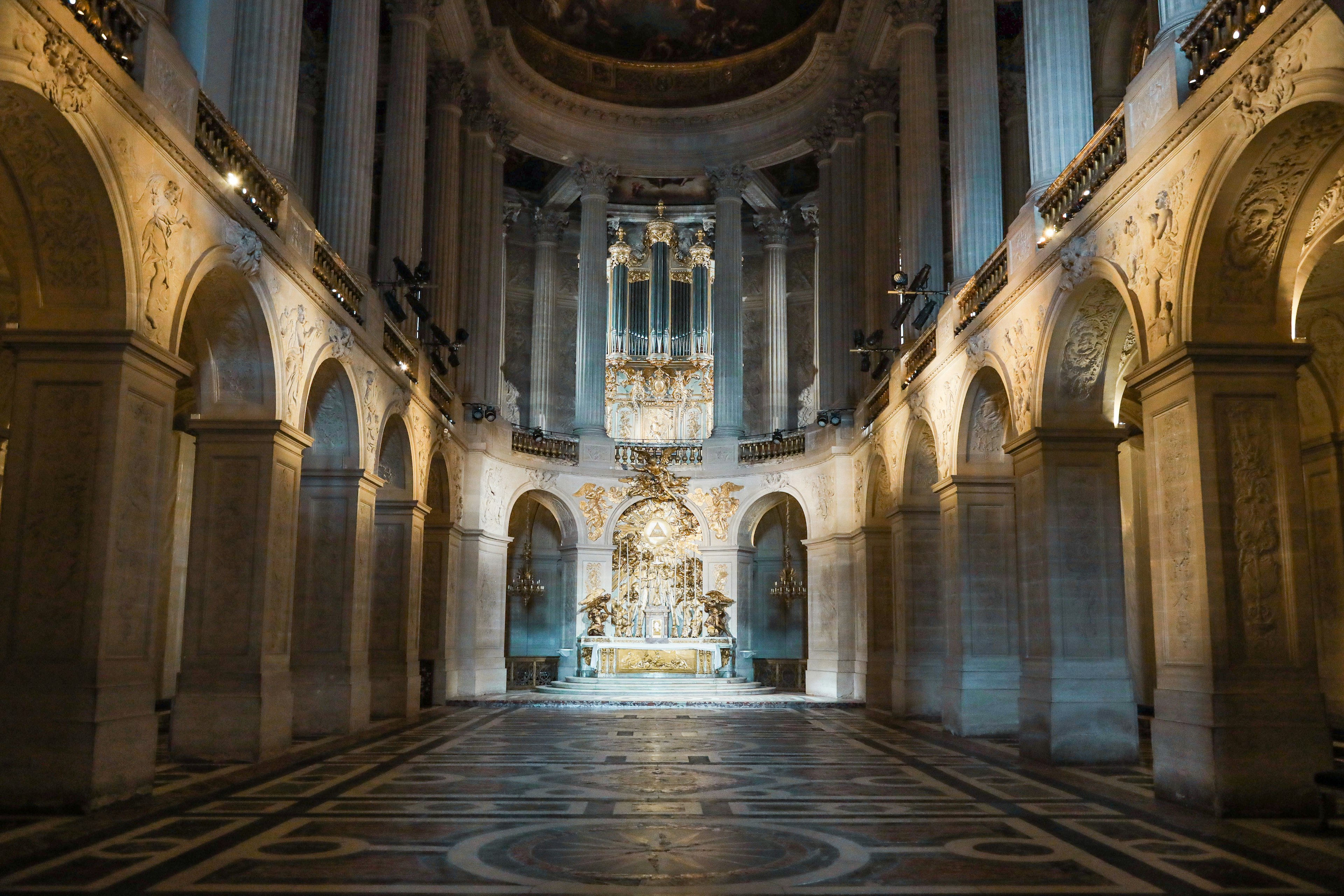 Interior of a grand church with majestic arches and beautiful frescoes