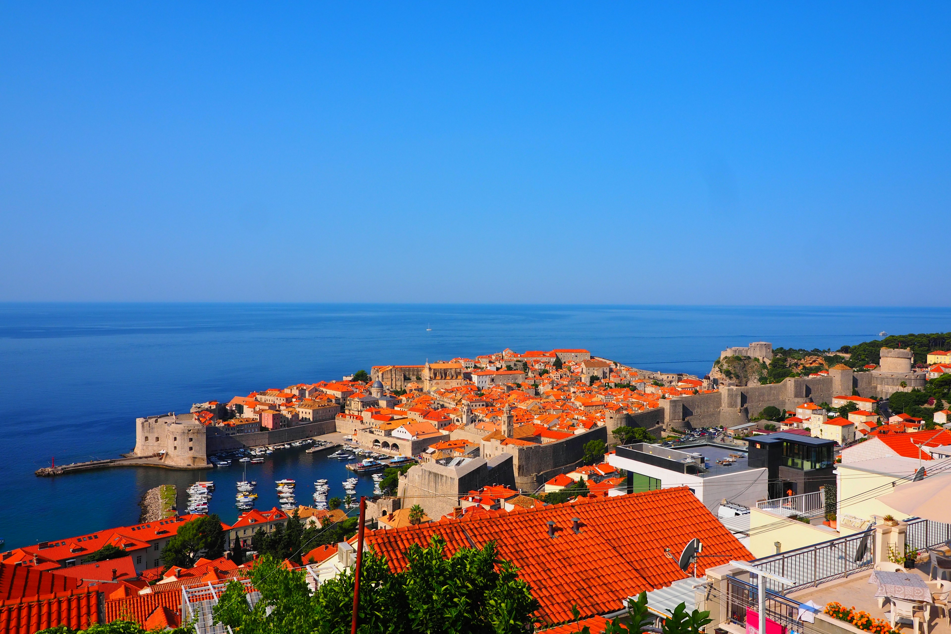 Stunning view of Dubrovnik with orange rooftops and blue sea