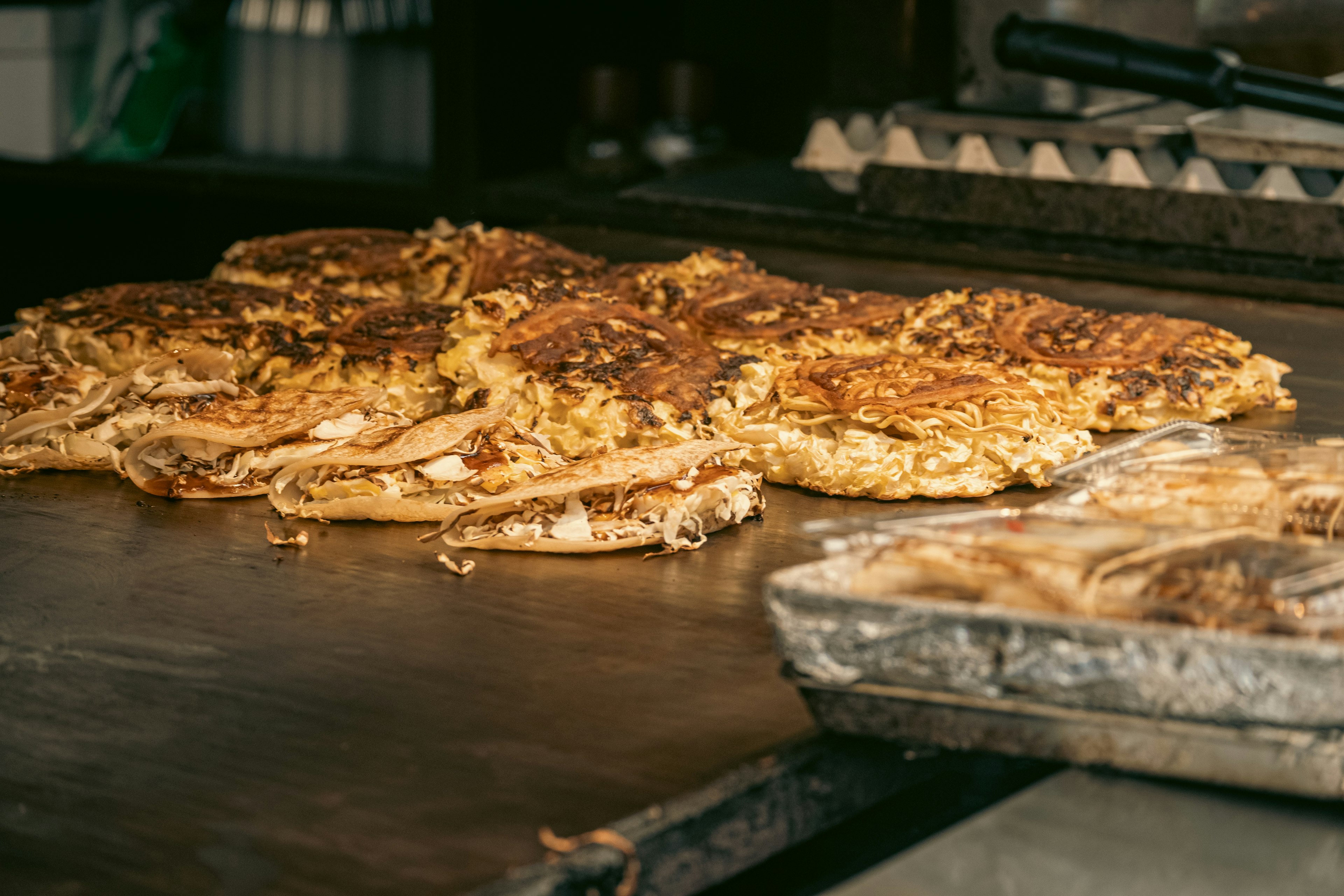 Grilled pancakes displayed on a hot griddle