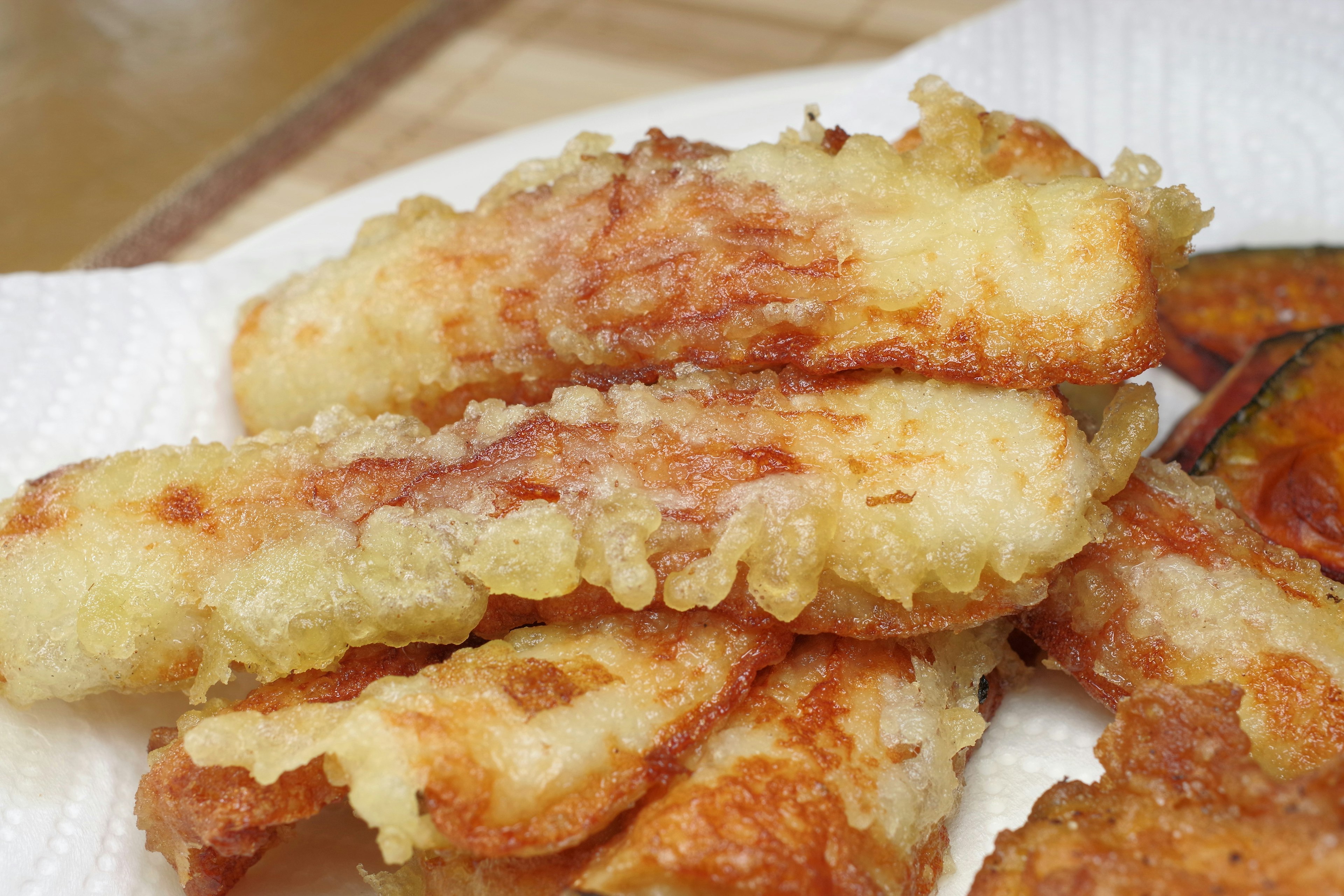 Fried banana slices served on a plate