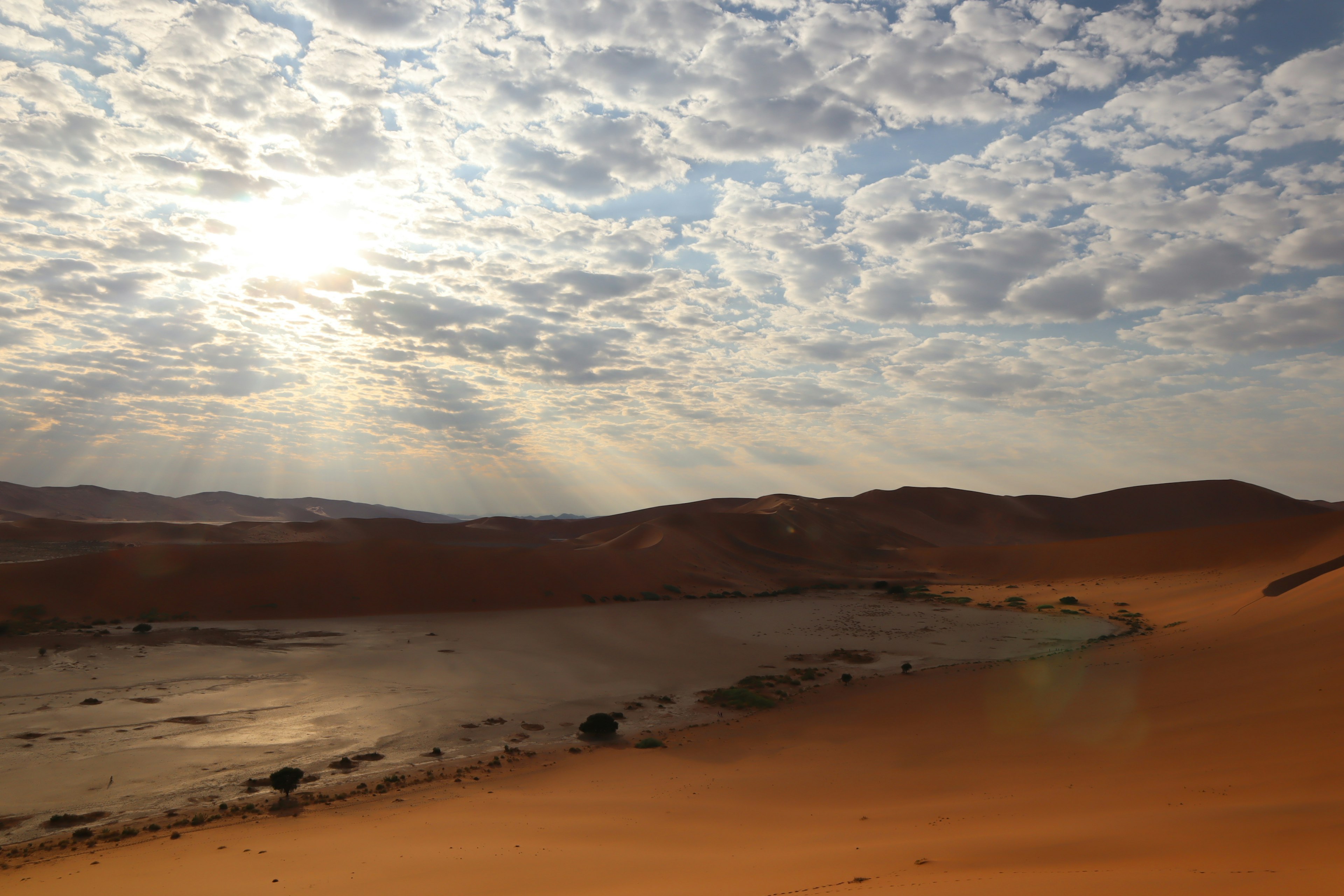 Expansive desert landscape with clouds in the sky