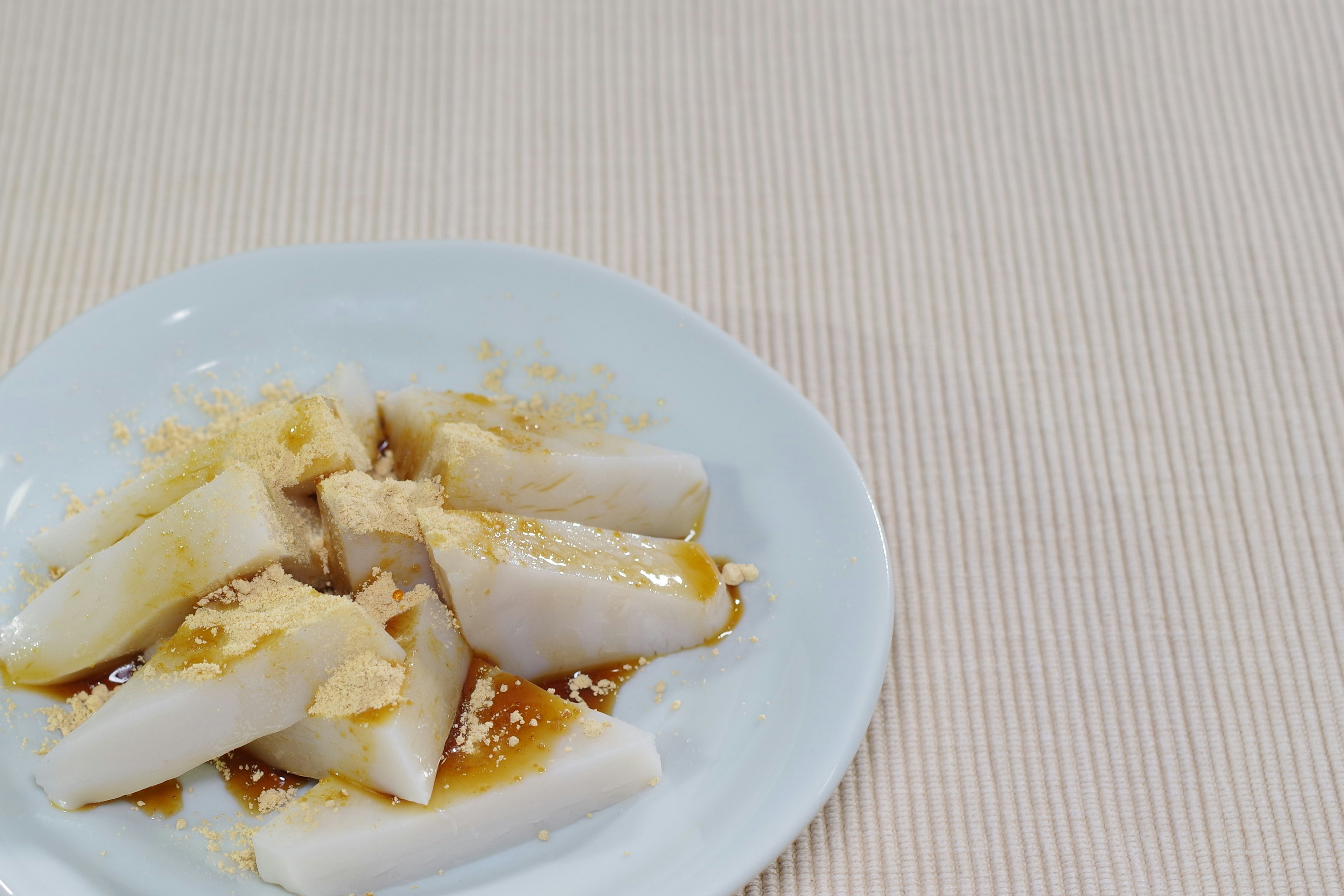 Sliced sweet dessert on a white plate