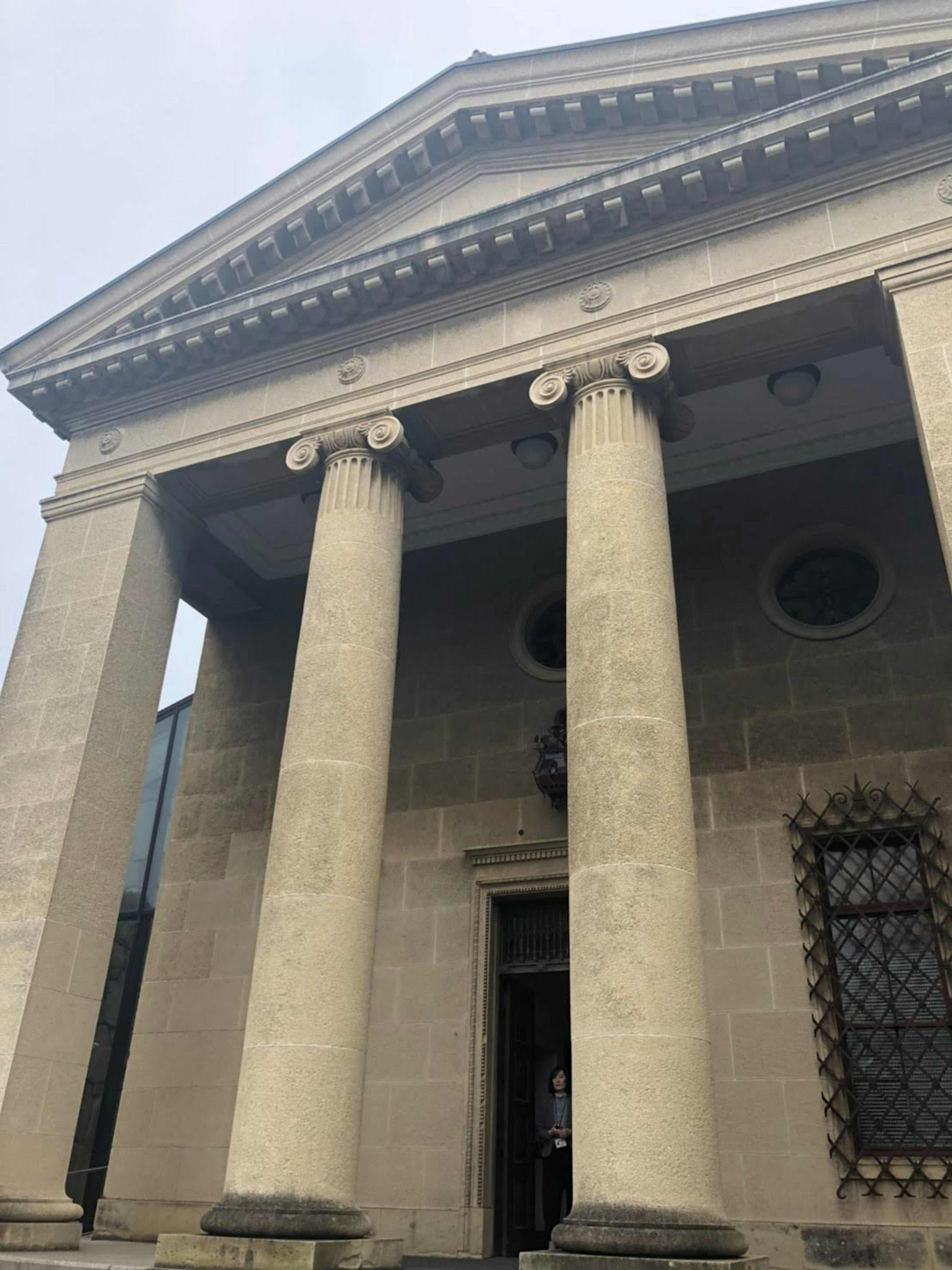 Exterior view of a classical architecture building with prominent columns