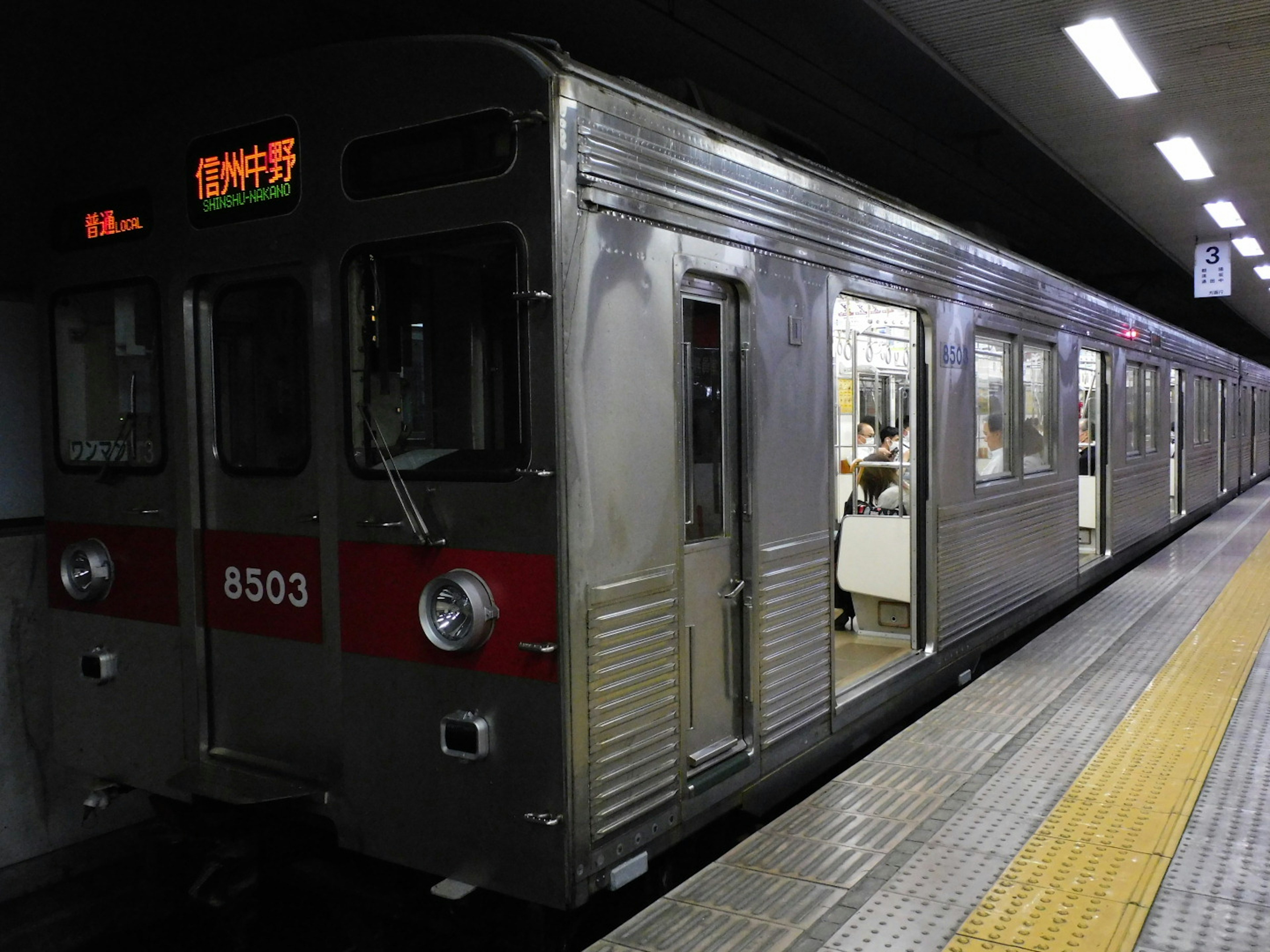 Image of a subway train at a station featuring train number 8503