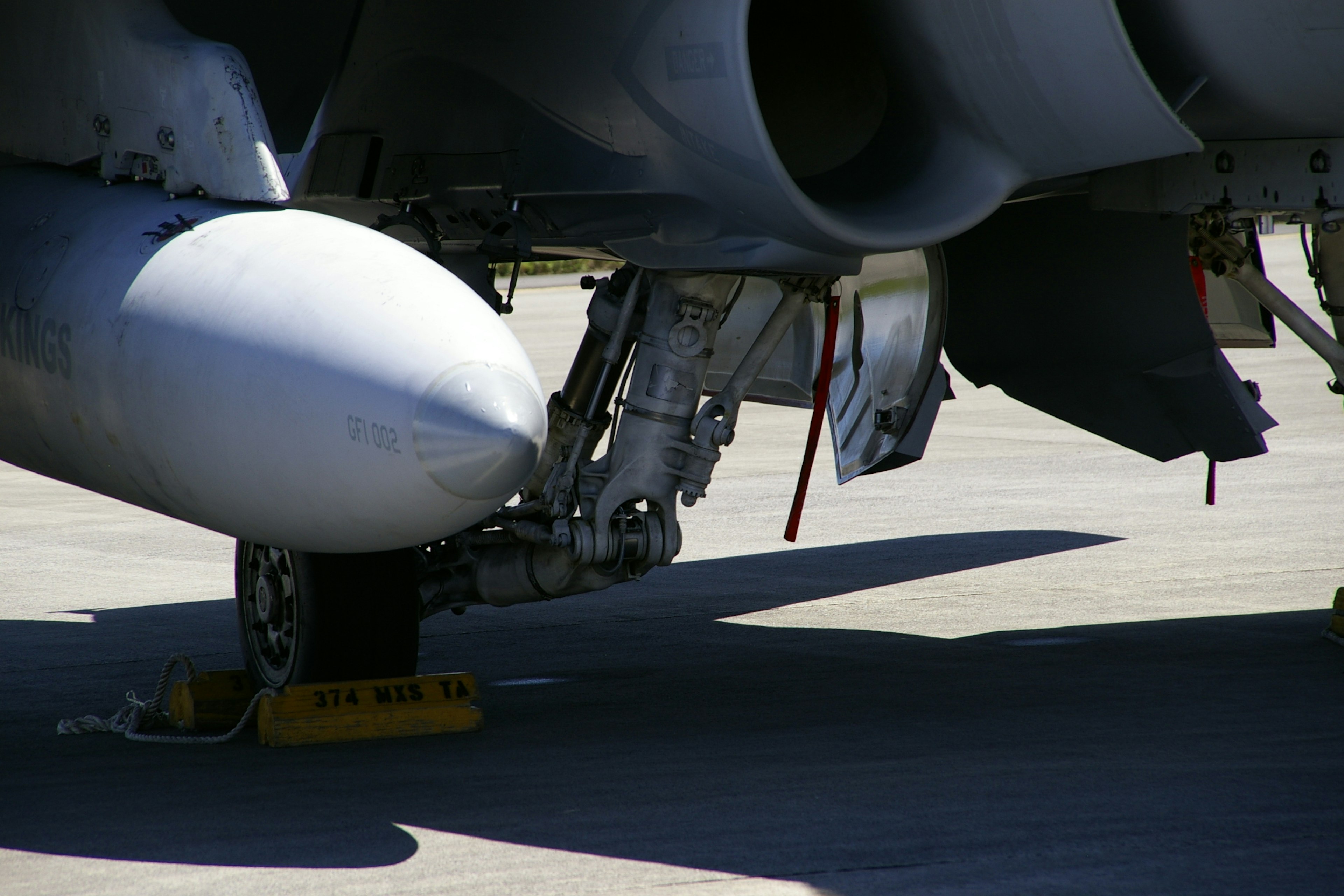 Close-up of aircraft engine and landing gear details