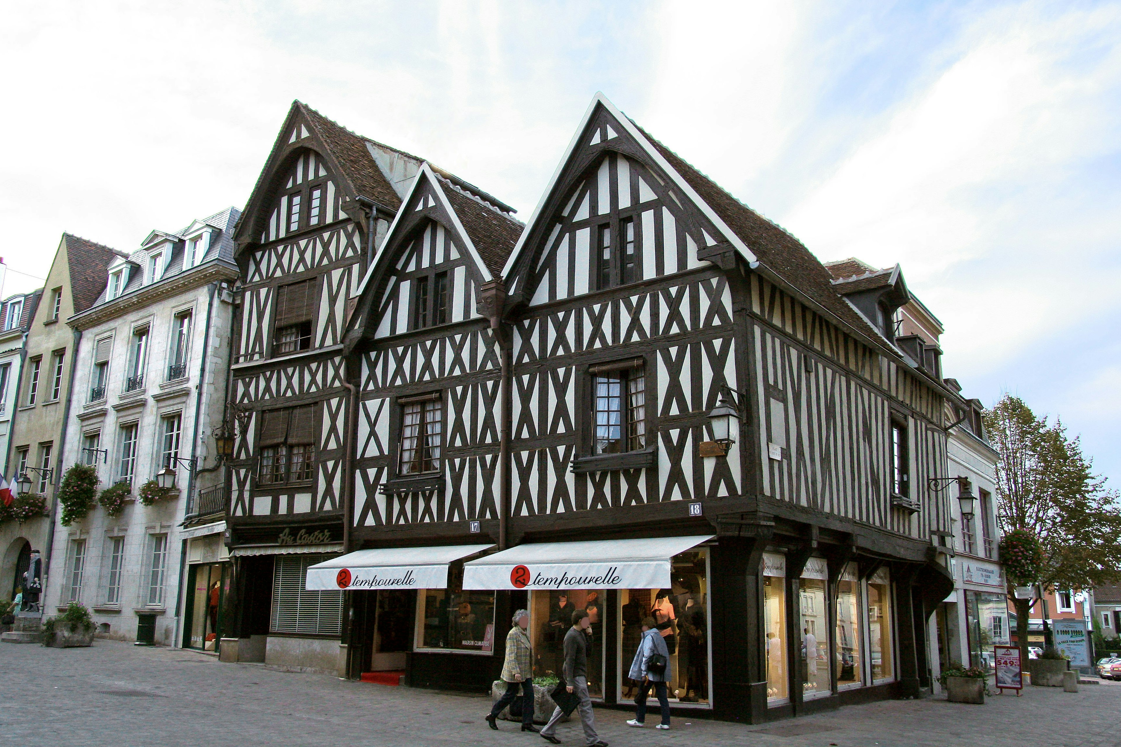 Street corner featuring timber-framed houses