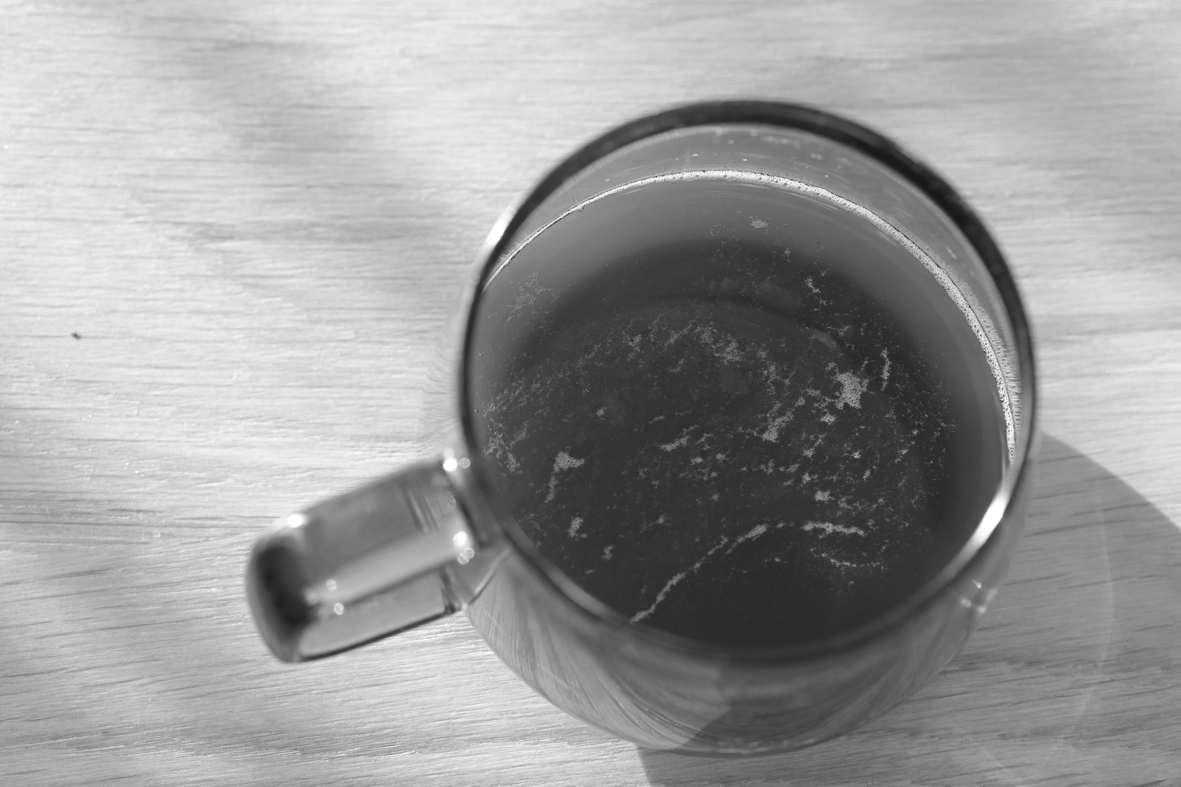 Overhead view of a transparent cup with liquid inside