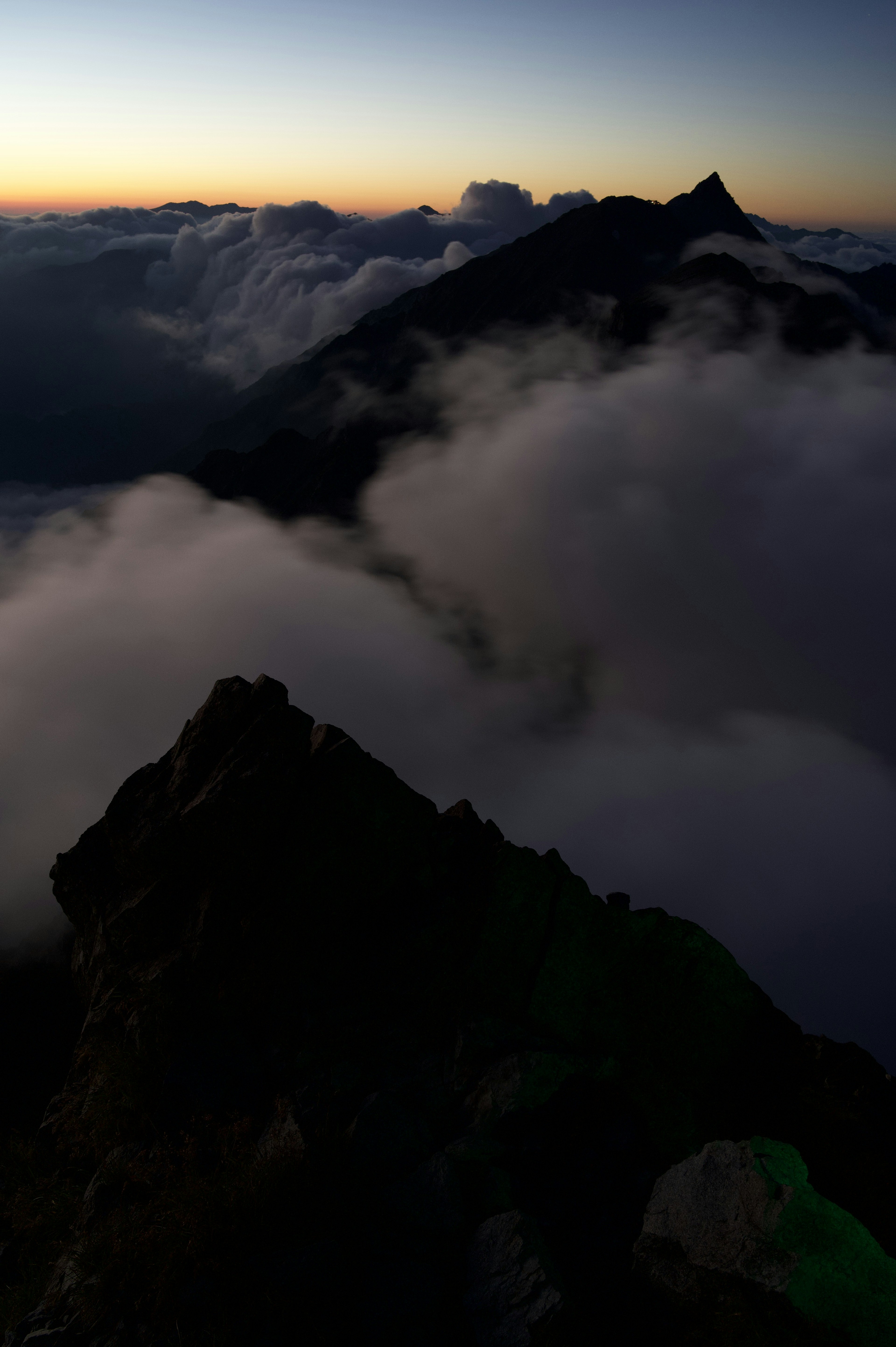 Mountain landscape at dusk with clouds