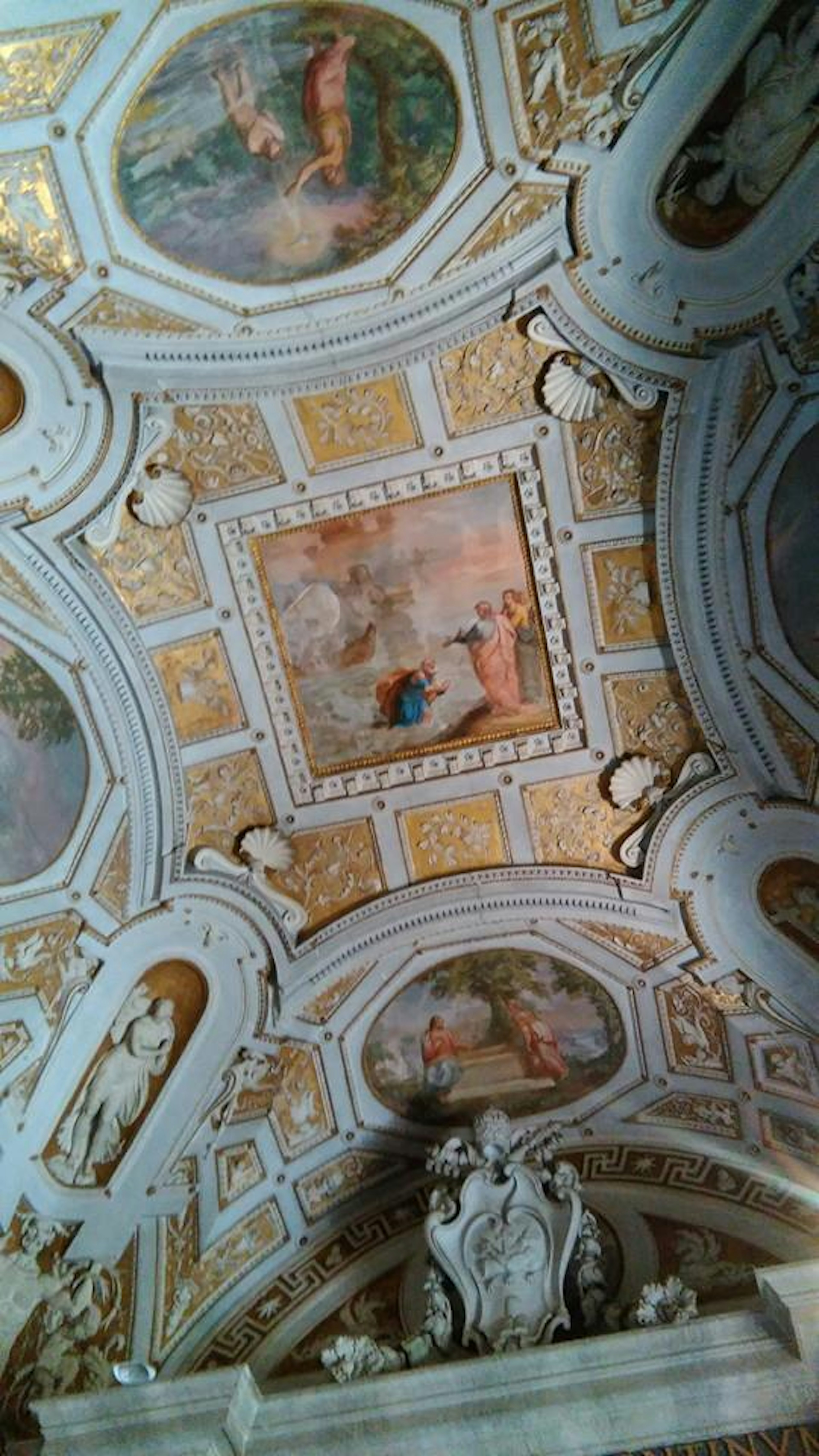 Ceiling featuring exquisite frescoes and golden decorations