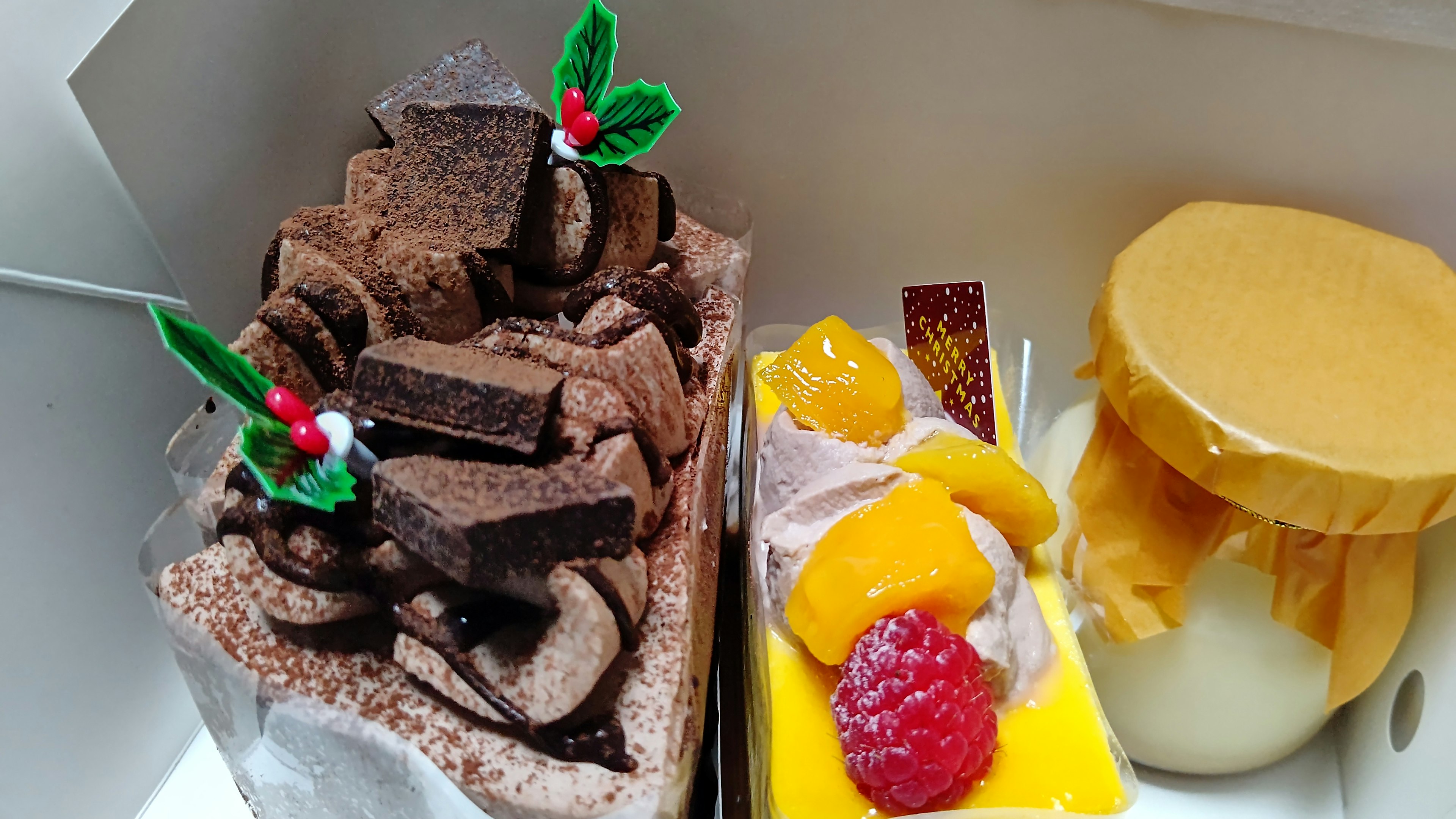 A combination of chocolate dessert and fruit dessert