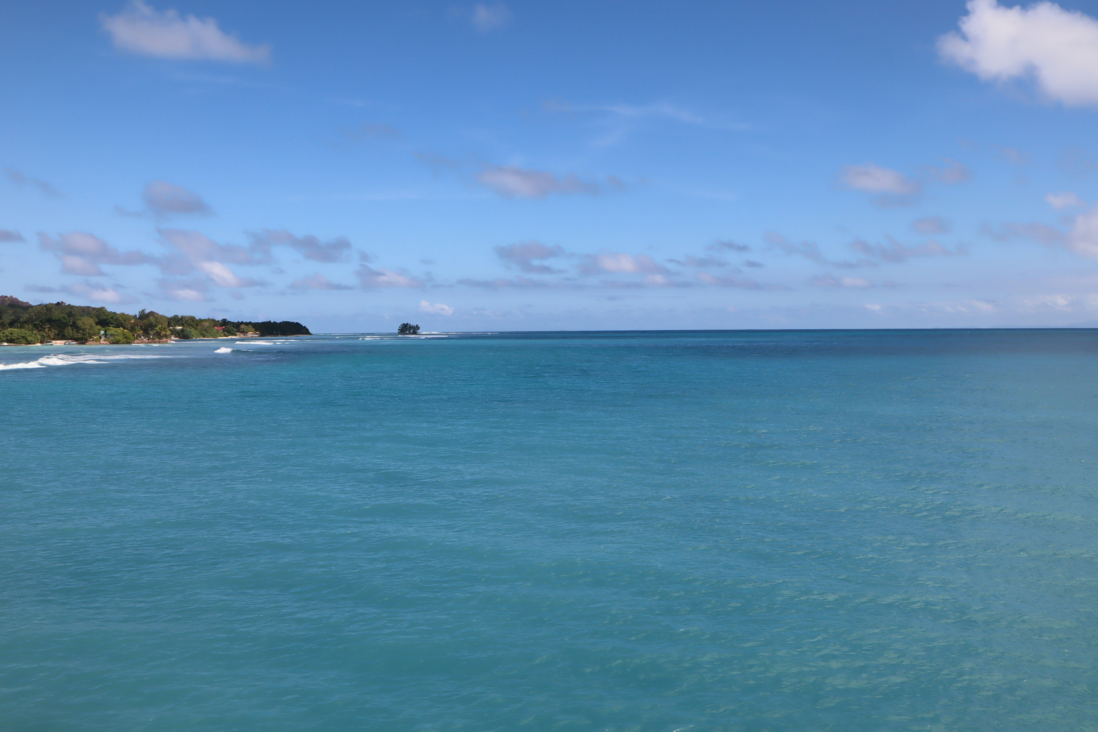 Calm blue ocean under a clear blue sky