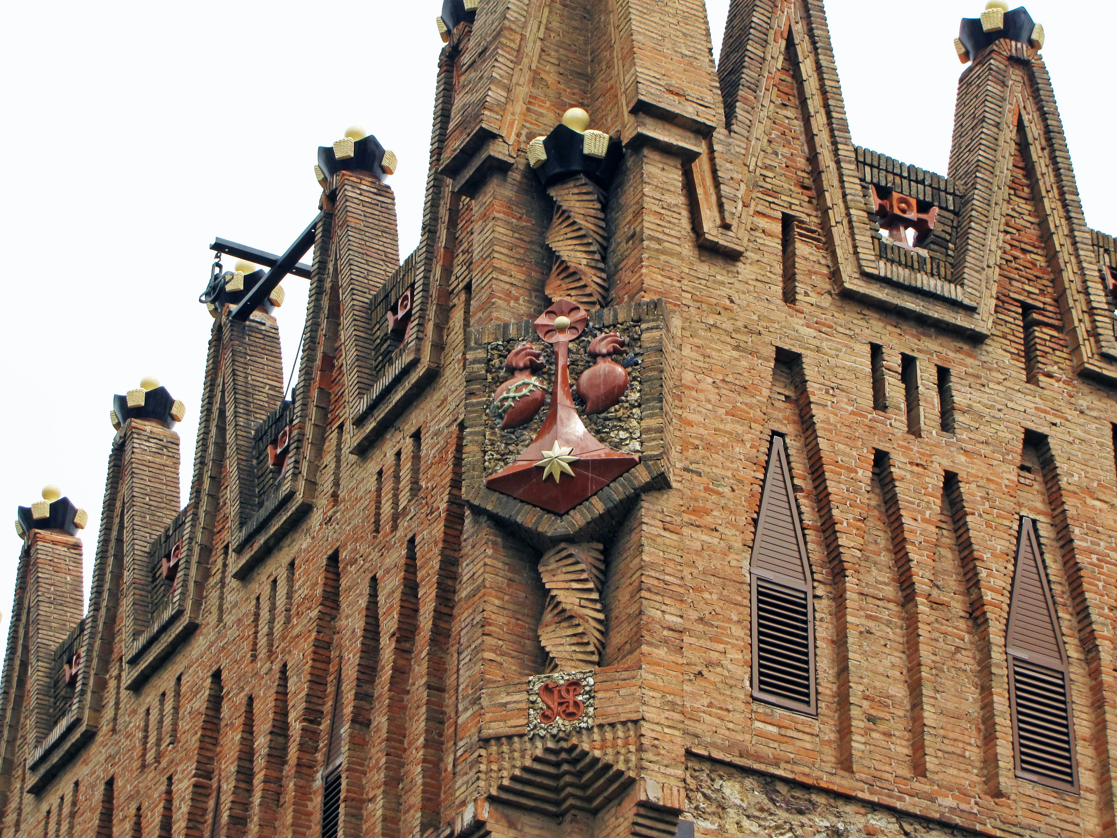 Gothic style building exterior with distinctive tile decorations