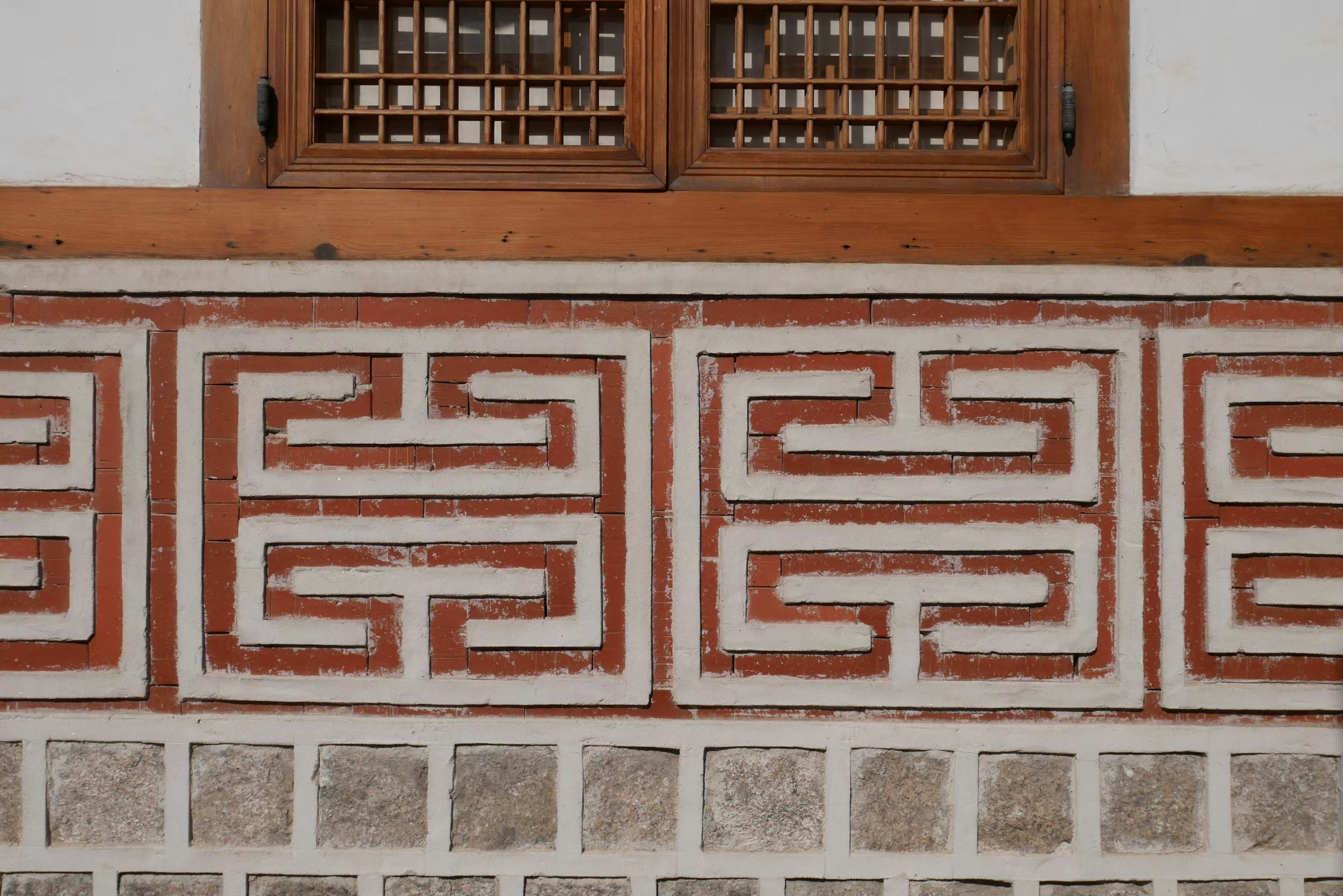 Decorative section of a traditional Korean architectural wall