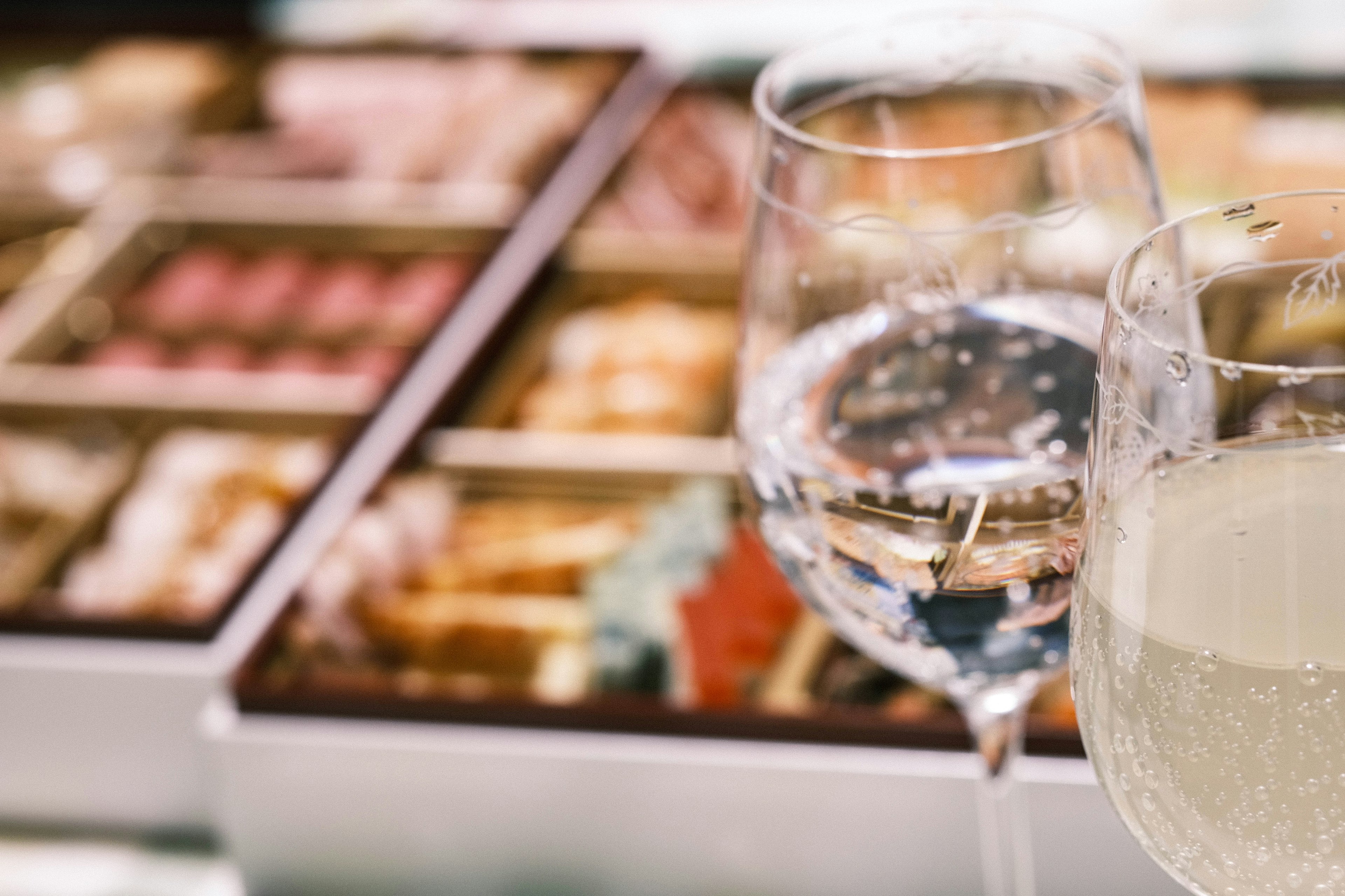 Close-up of beautifully arranged food and drinks in glasses