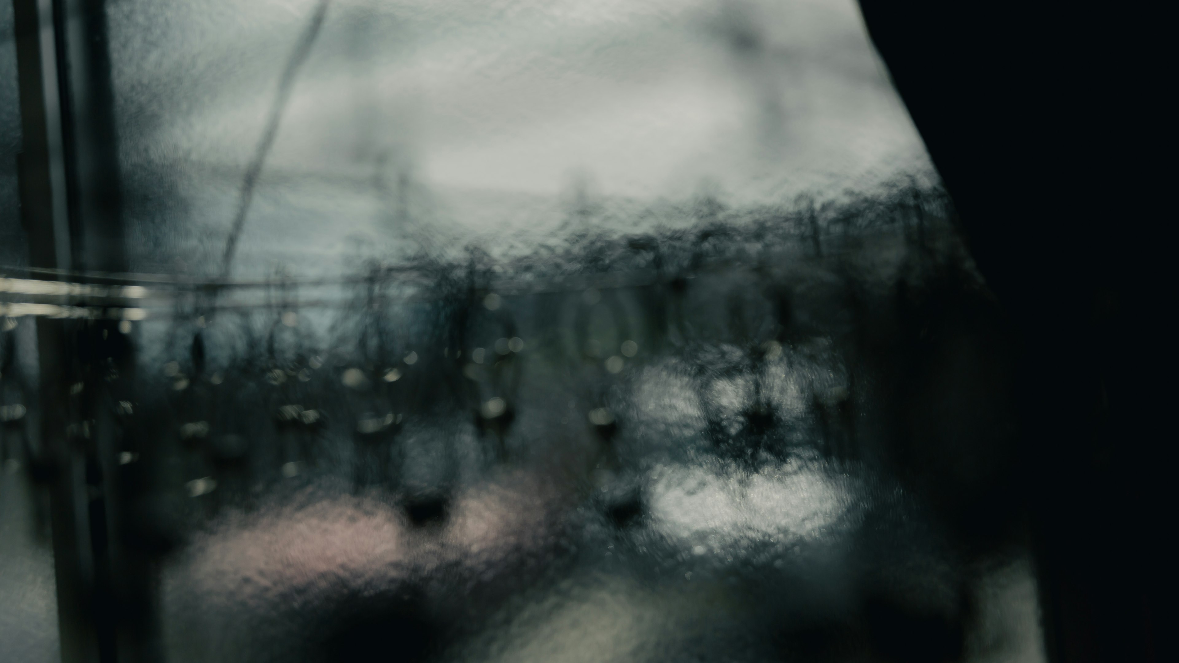 Blurred background with droplets on a glass surface