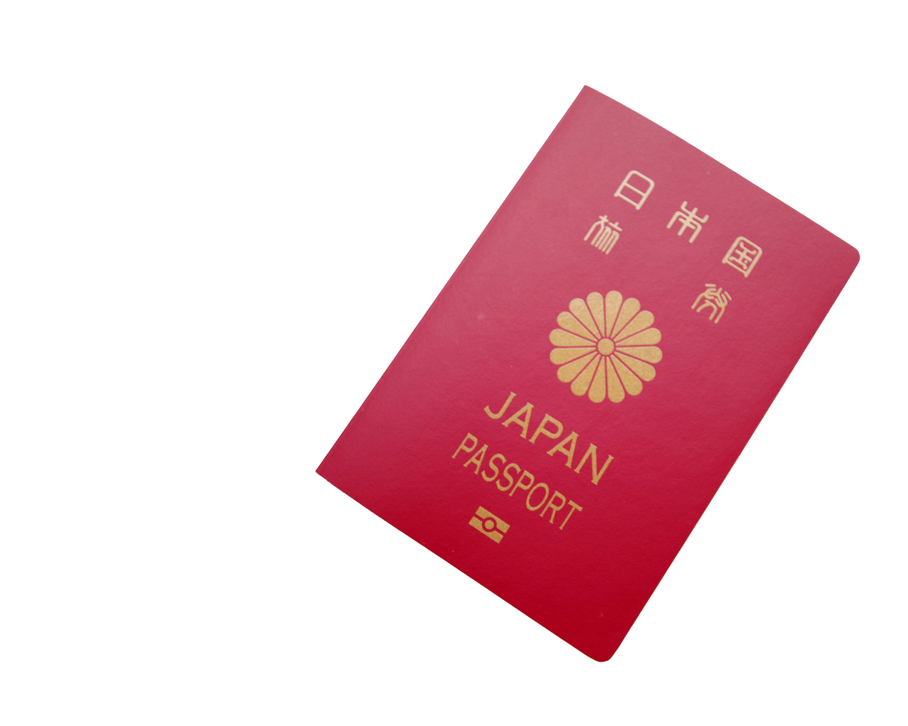 Pasaporte japonés con cubierta roja y letras doradas