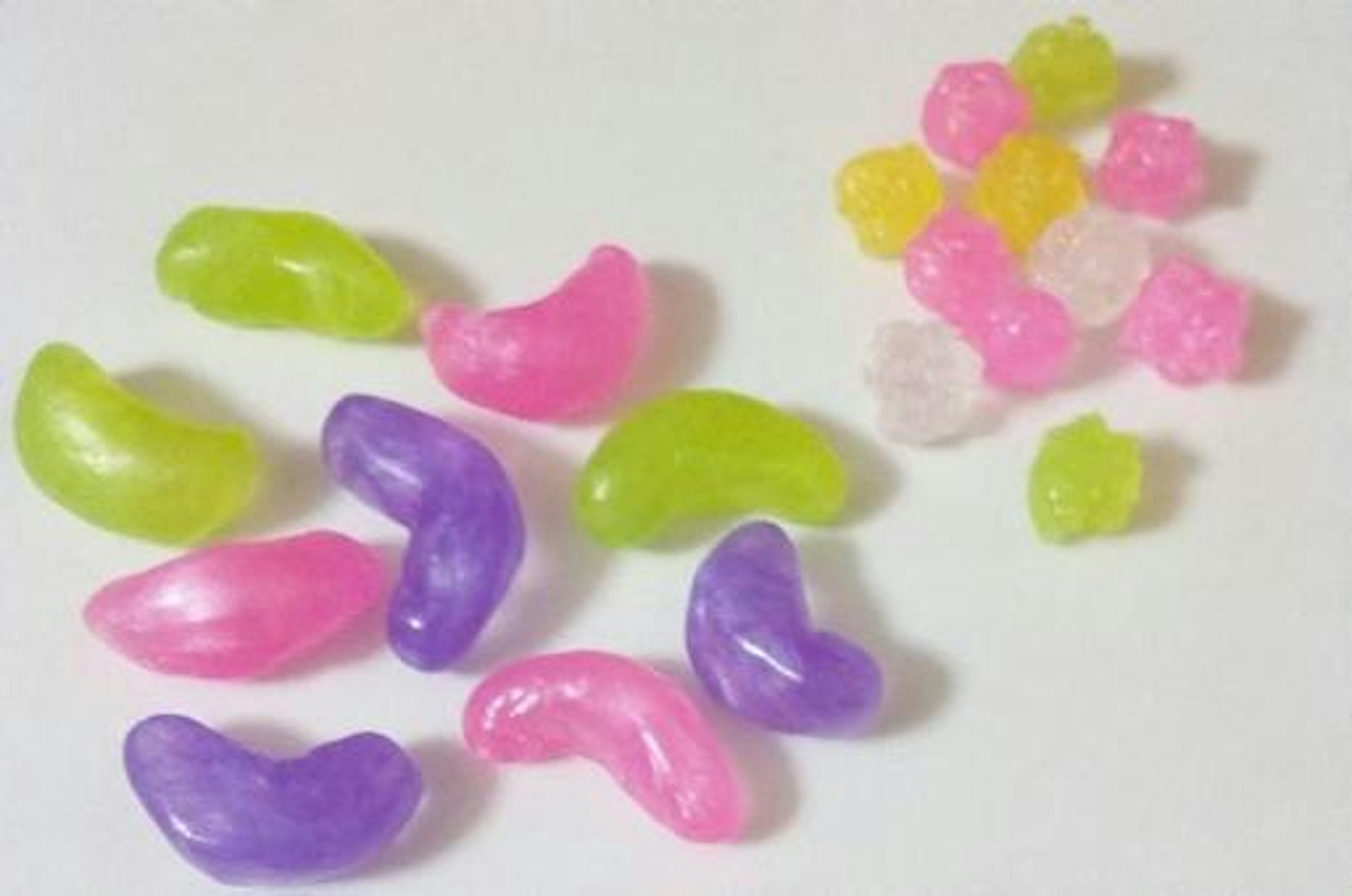 Colorful assortment of candies on a white background