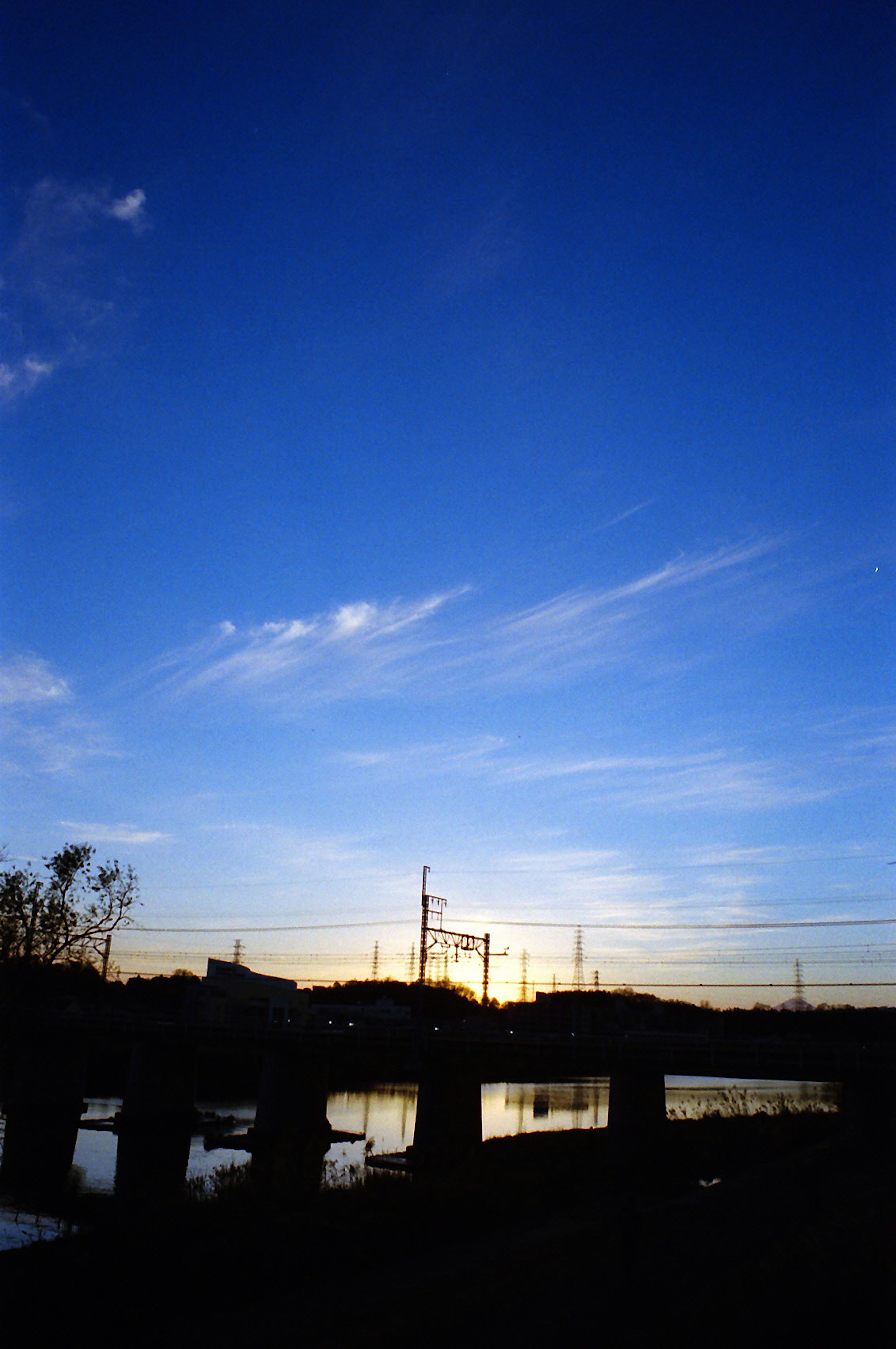 Blue sky with clouds and silhouette of sunset