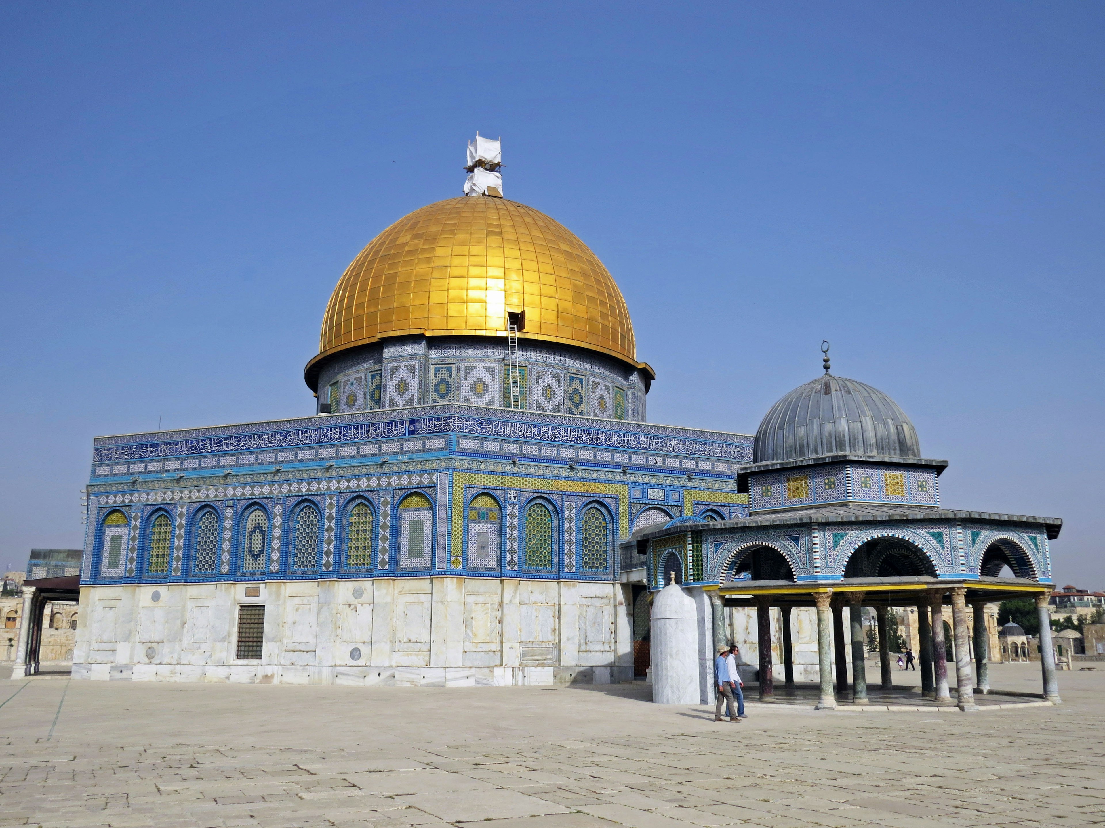 Dome of the Rock with a golden dome and intricate blue tile work