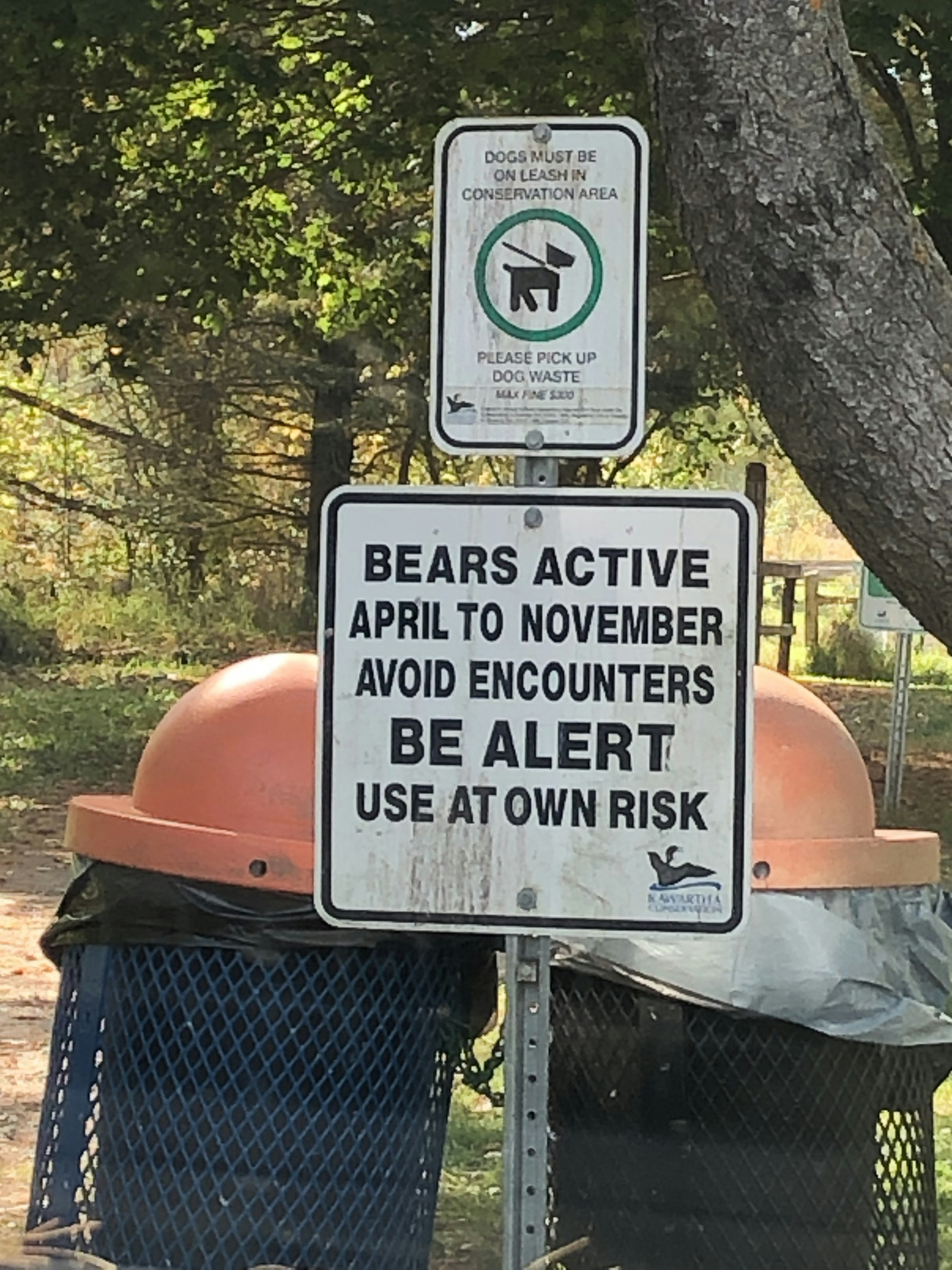 Bear warning sign indicating active months from April to November