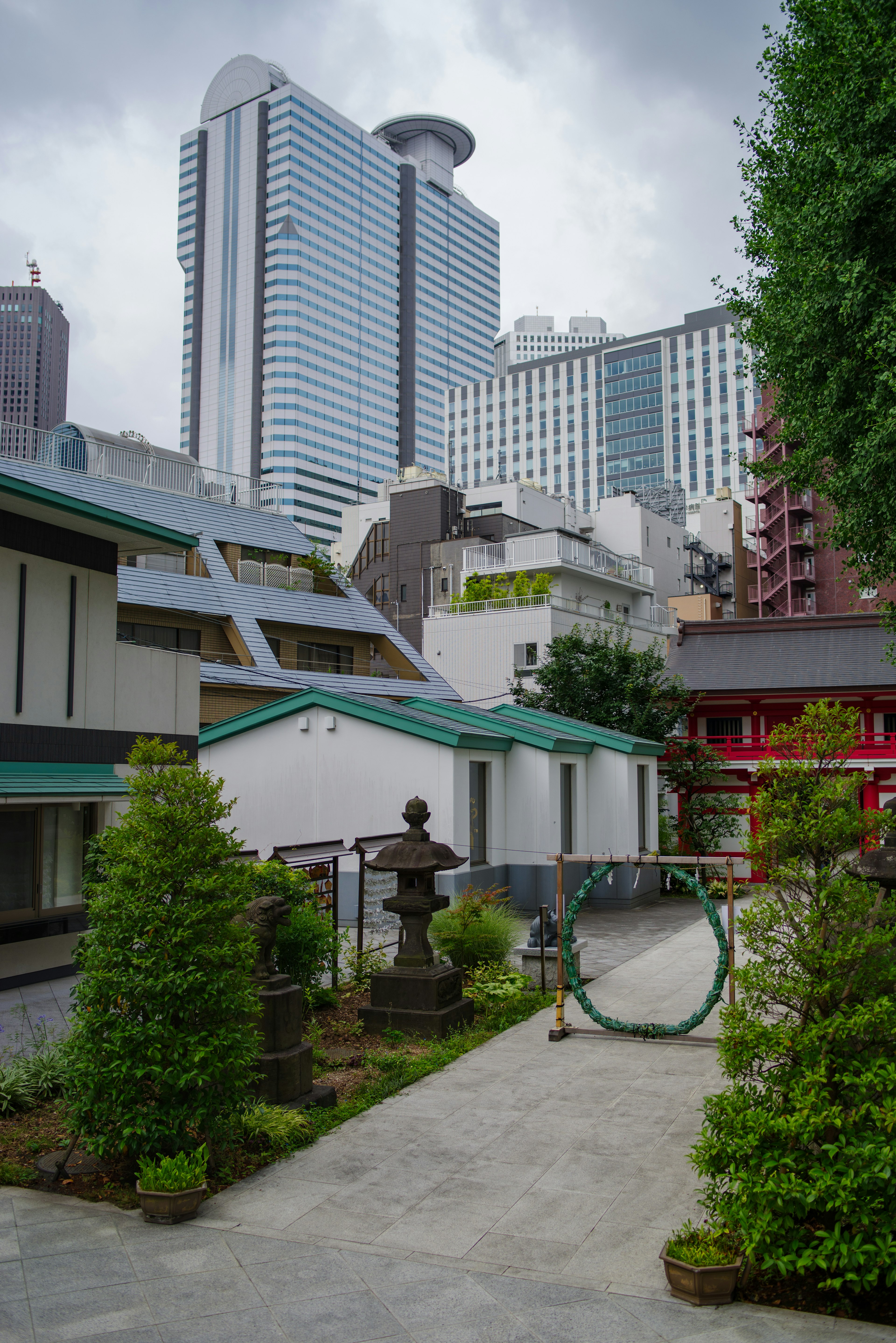 Urban landscape featuring high-rise buildings and traditional architecture